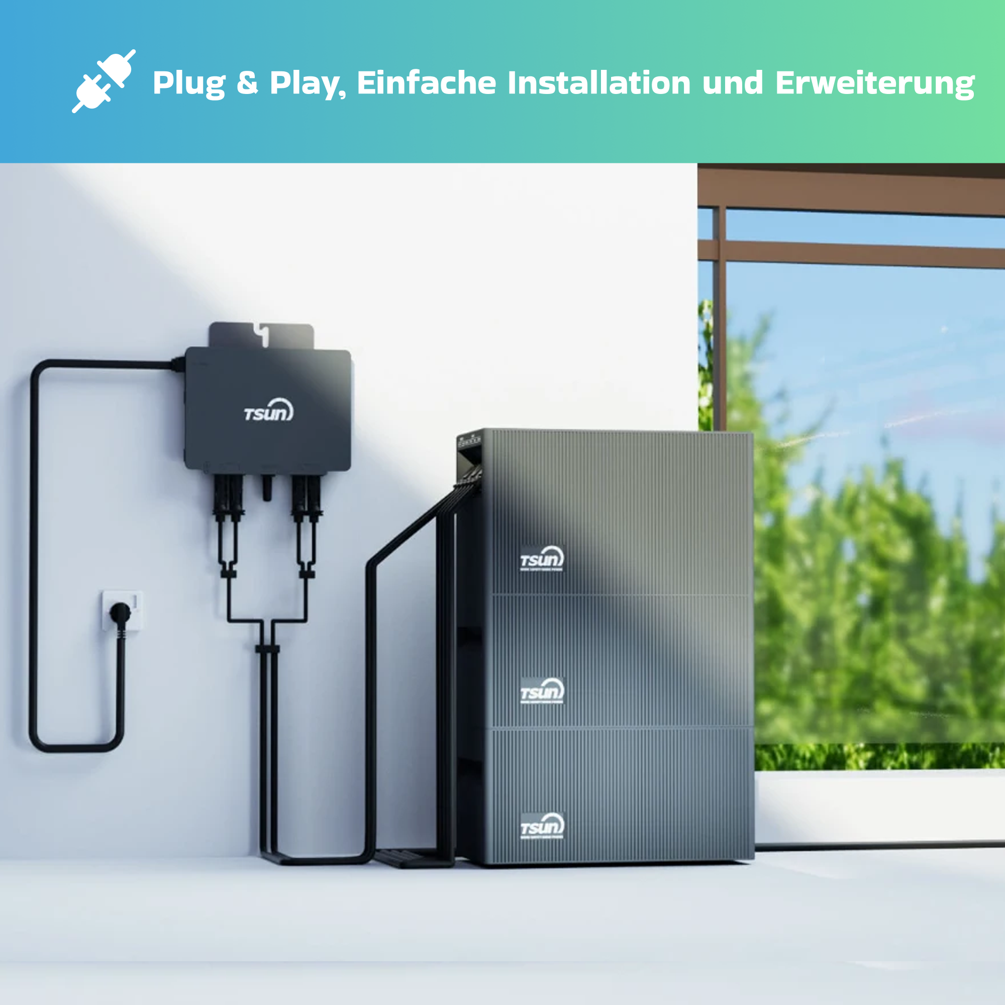 Ein grauer Energiespeicher neben einem Fenster mit grünen Bäumen draußen.