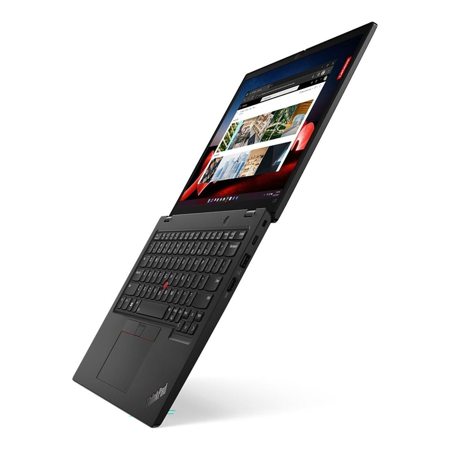 Schwarzer Lenovo ThinkPad Laptop mit geöffnetem Bildschirm, der eine Webseite mit Bildern anzeigt.