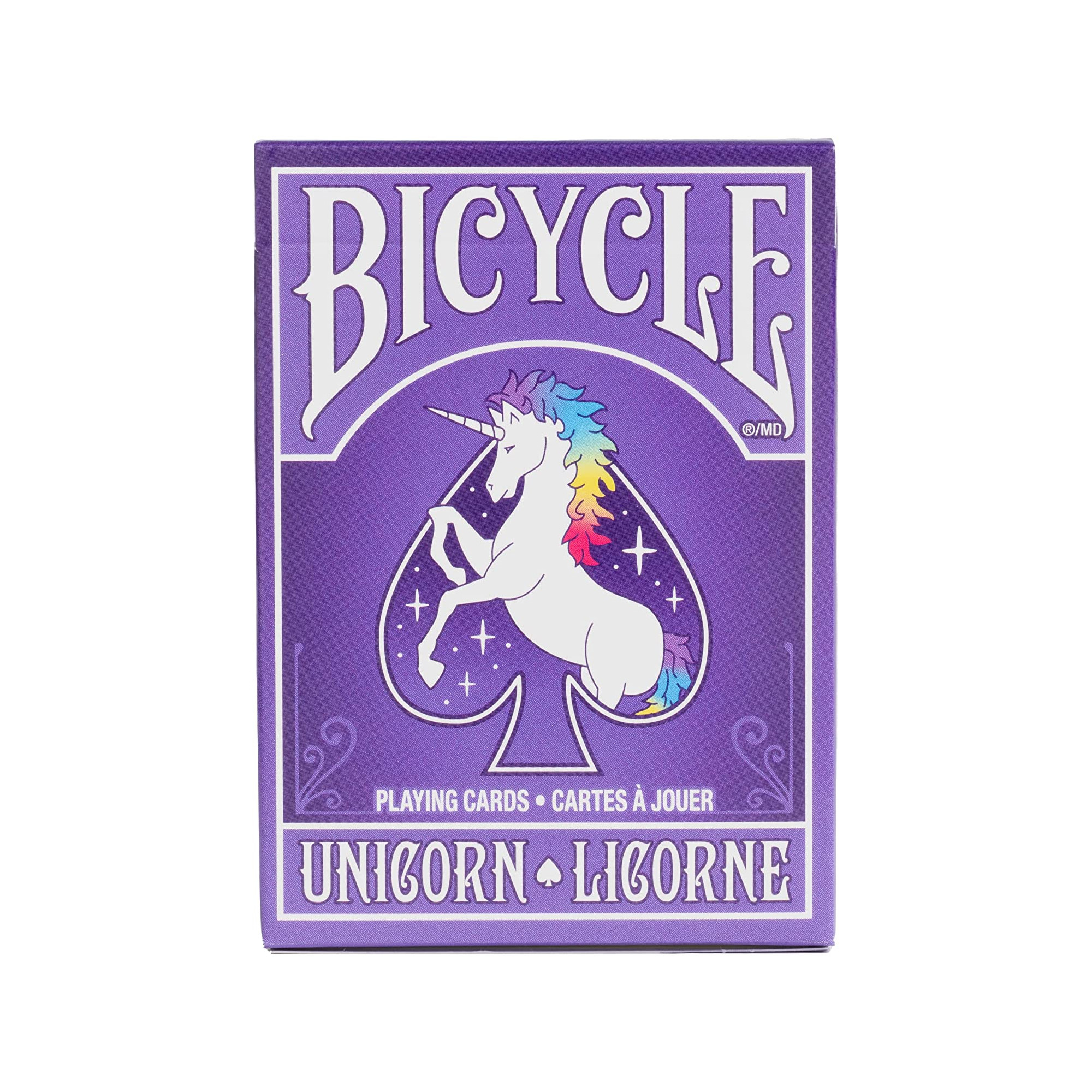 Lila Spielkartenschachtel mit einem weißen Einhorn mit Regenbogenmähne und -schwanz.