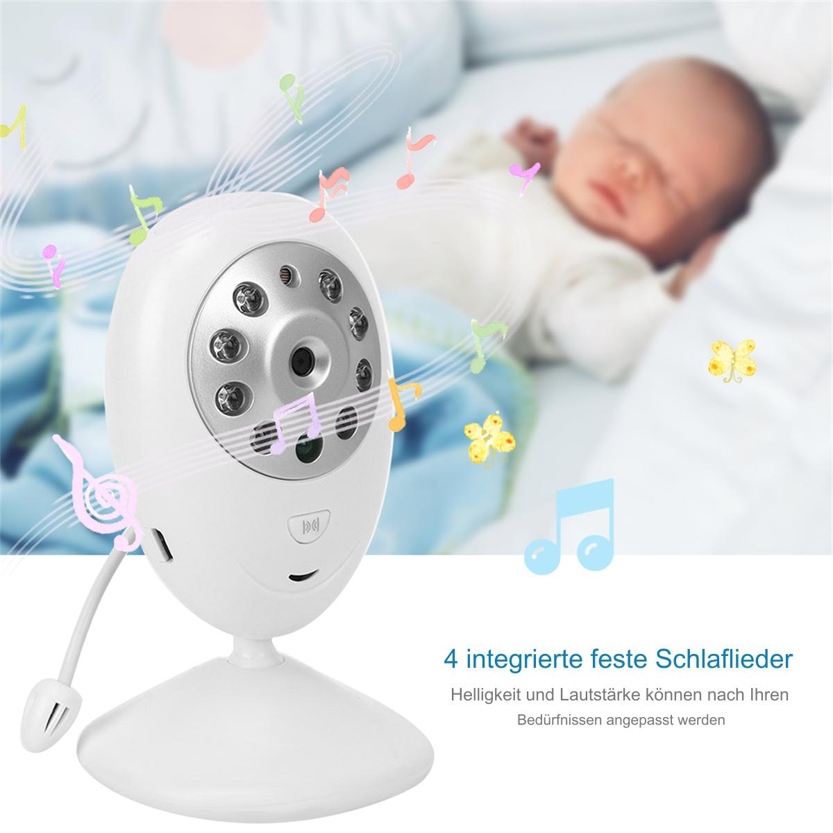 Ein Babyphone mit Kamera und Musiknoten vor einem schlafenden Baby.