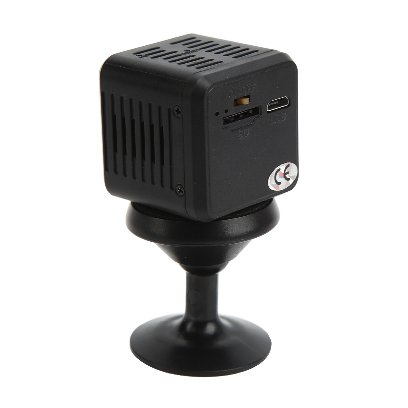 Ein winziges schwarzes Würfel-Gadget mit Lüftungsschlitzen auf einem Ständer.