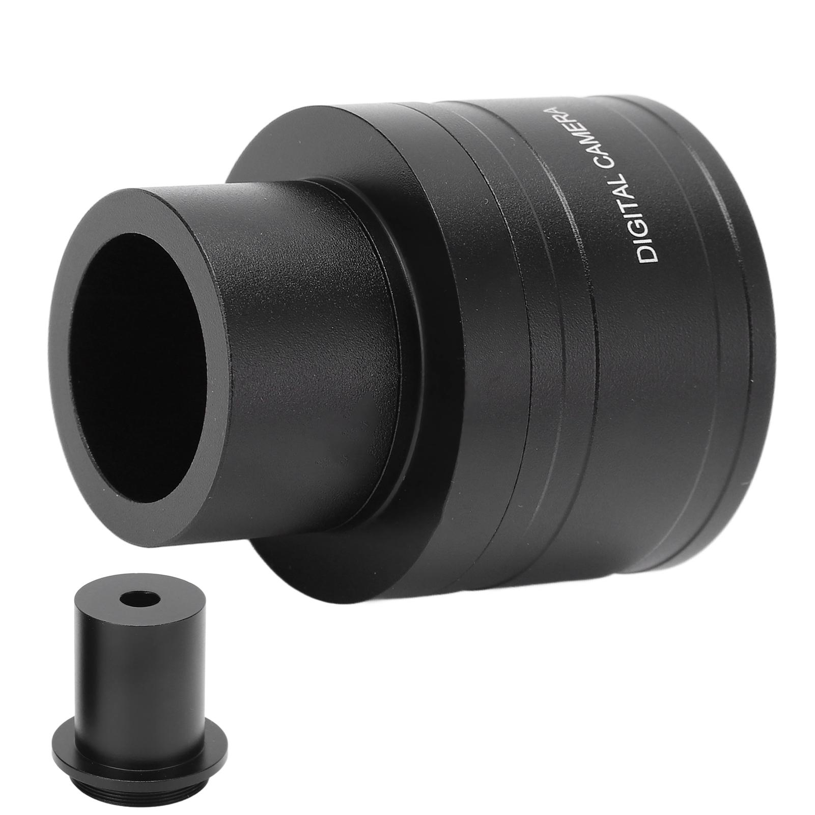 Ein schwarzer Adapter mit Beschriftung 'DIGITAL CAMERA' und einem separaten Stift.