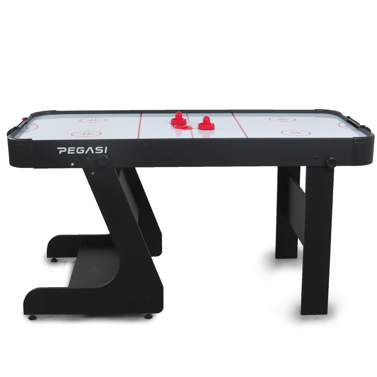 A black air hockey table with red paddles and pucks on a white playing surface.