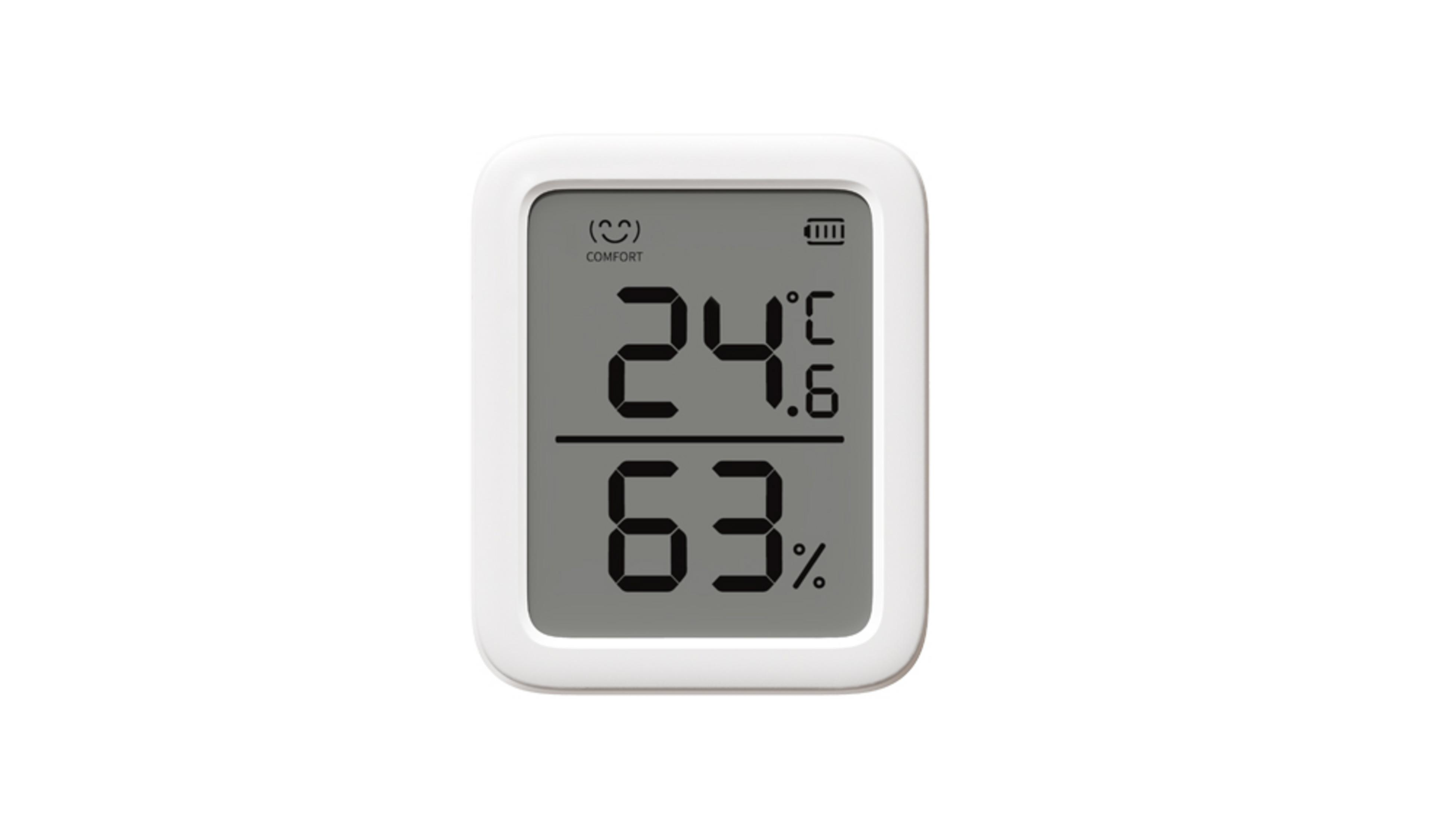 Ein weißer Thermohygrometer zeigt 24 Grad und 63 Prozent Luftfeuchtigkeit an.