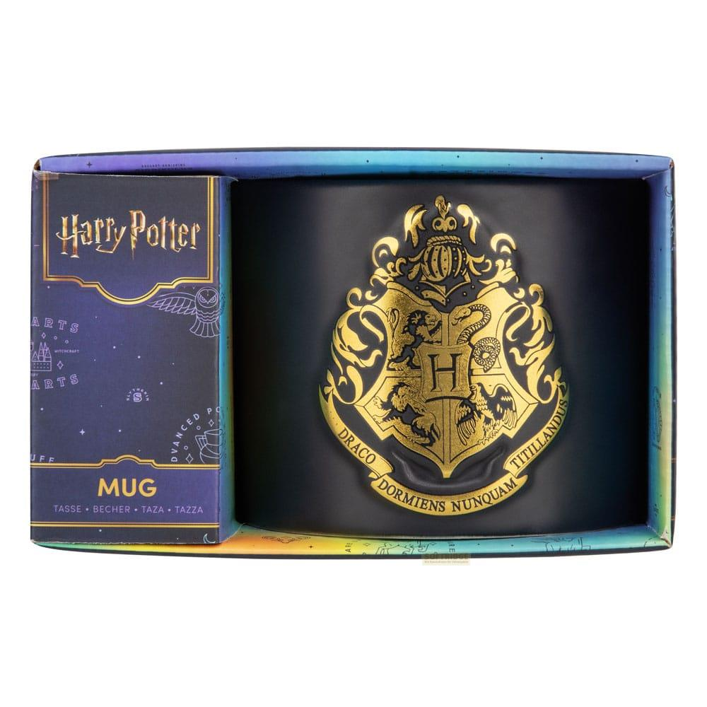 Kubek Harry Potter w pudełku, z herbem Hogwartu i złotym napisem.
