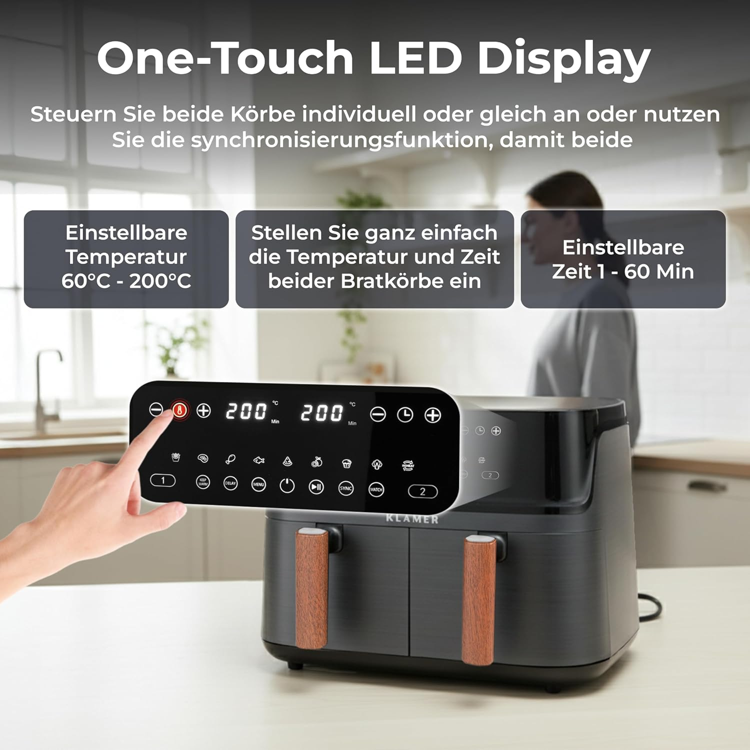 Ein schwarzer Heißluftfritteuse mit zwei Körben und Holzgriffen. Das LED-Display zeigt 200 Grad an.