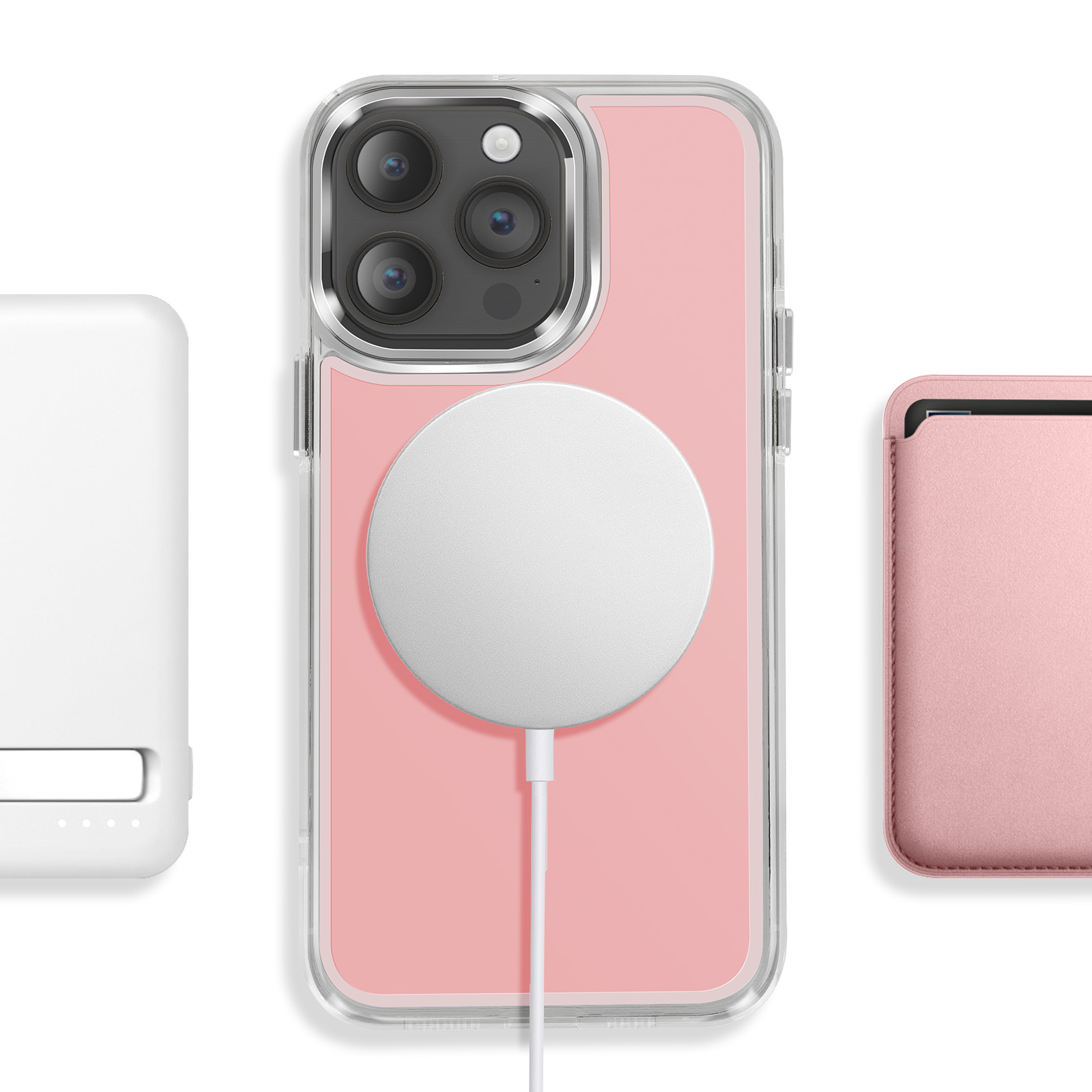 Batterie externe blanche, iPhone rose avec coque, chargeur MagSafe, porte-cartes rose.