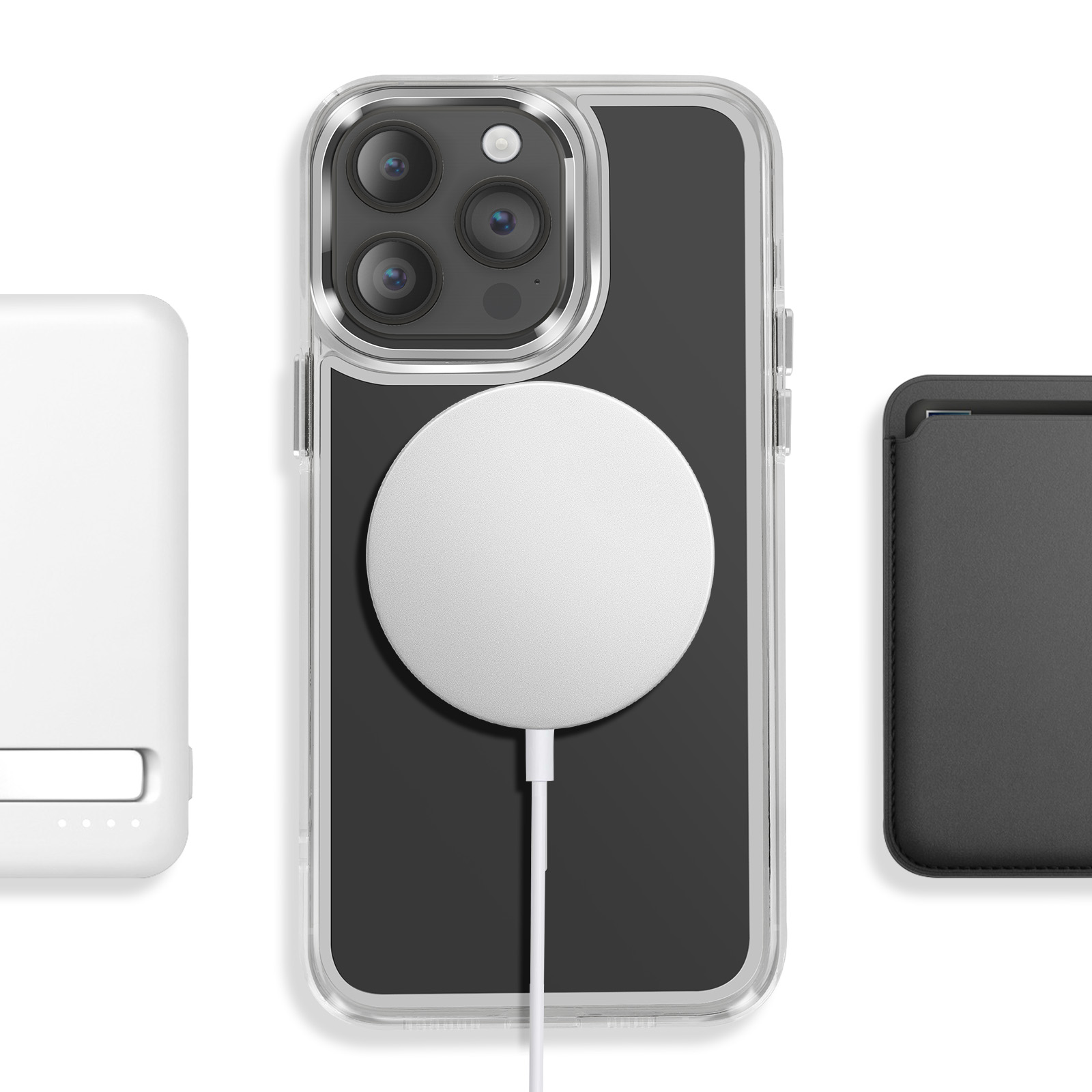 iPhone avec chargeur MagSafe, batterie externe blanche et porte-cartes noir.