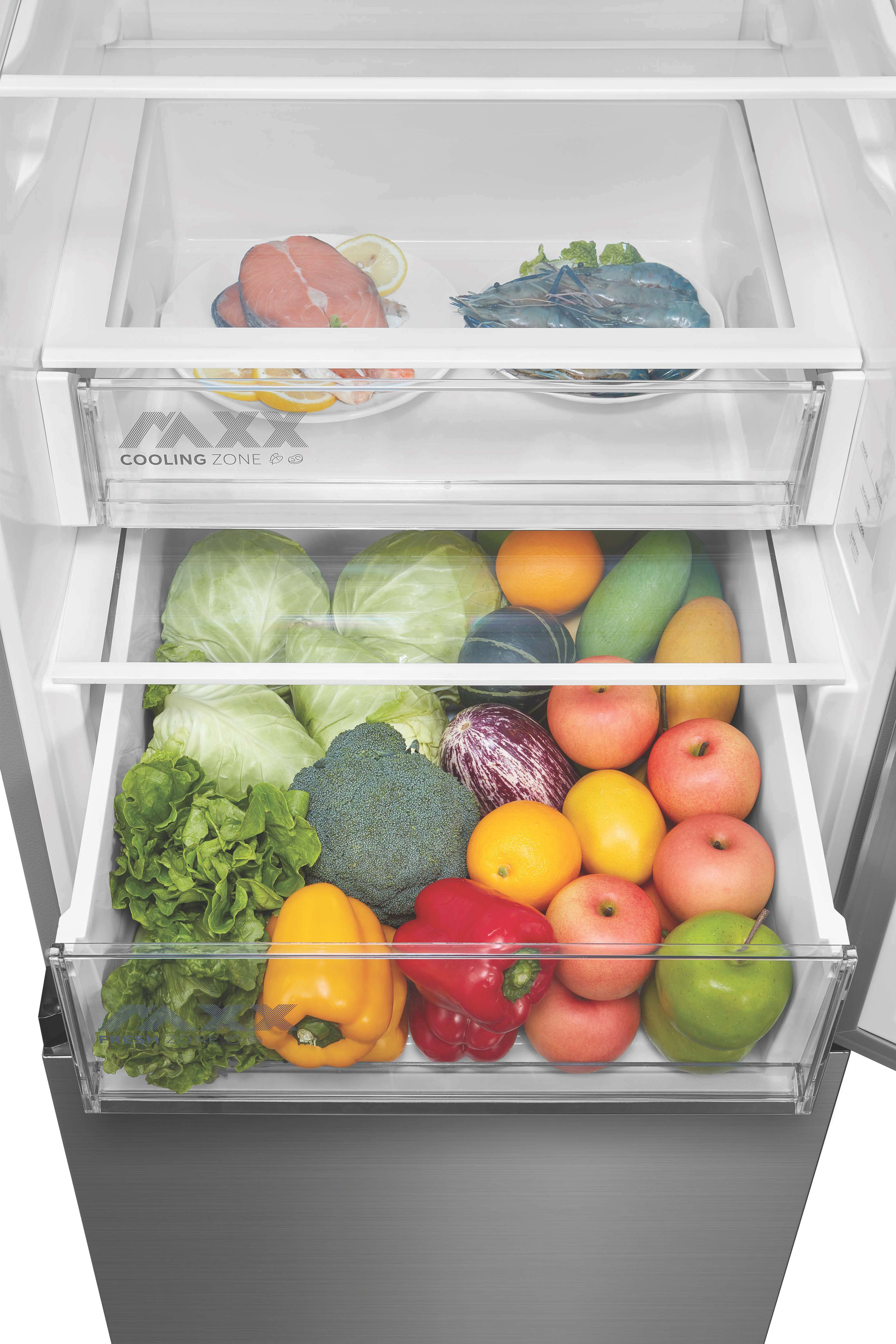 Ein Kühlschrank mit mehreren Schubladen, gefüllt mit frischem Obst und Gemüse.