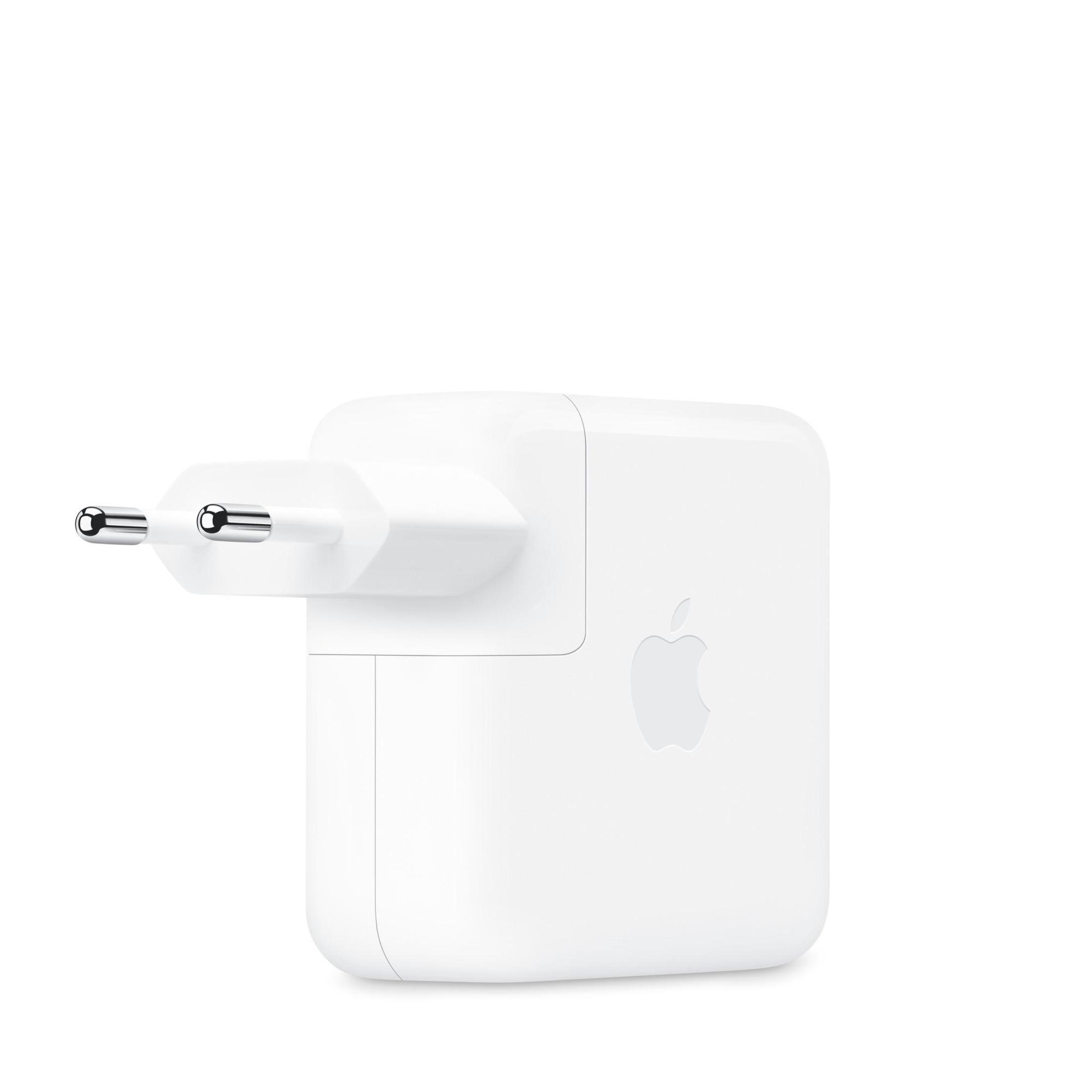 Un alimentatore Apple bianco con due pin metallici e logo Apple.