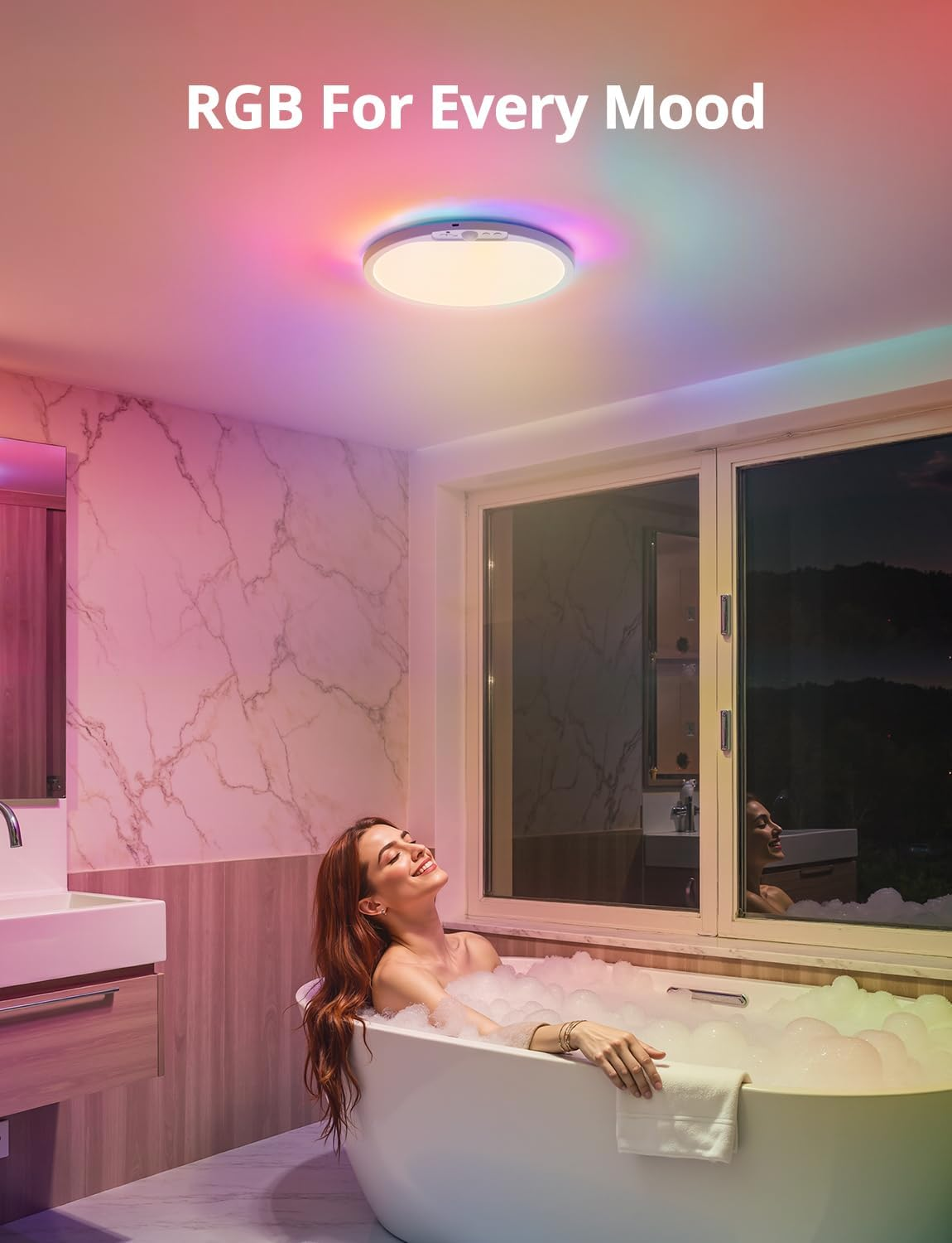 Una donna in un bagno di schiuma, illuminata da luci RGB sul soffitto.