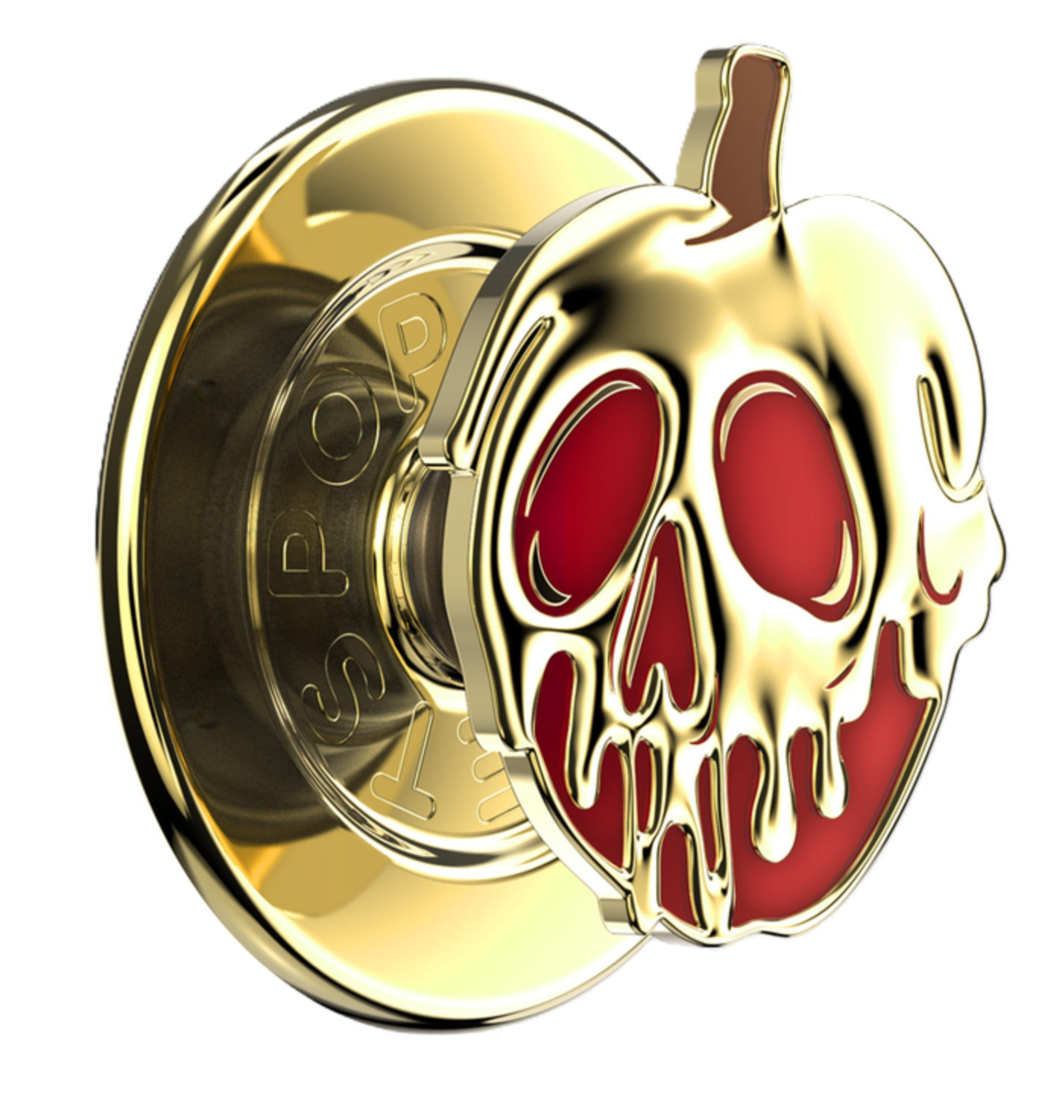 Goldener Apfel mit Totenkopfdesign und roten Vertiefungen, auf weißem Hintergrund.