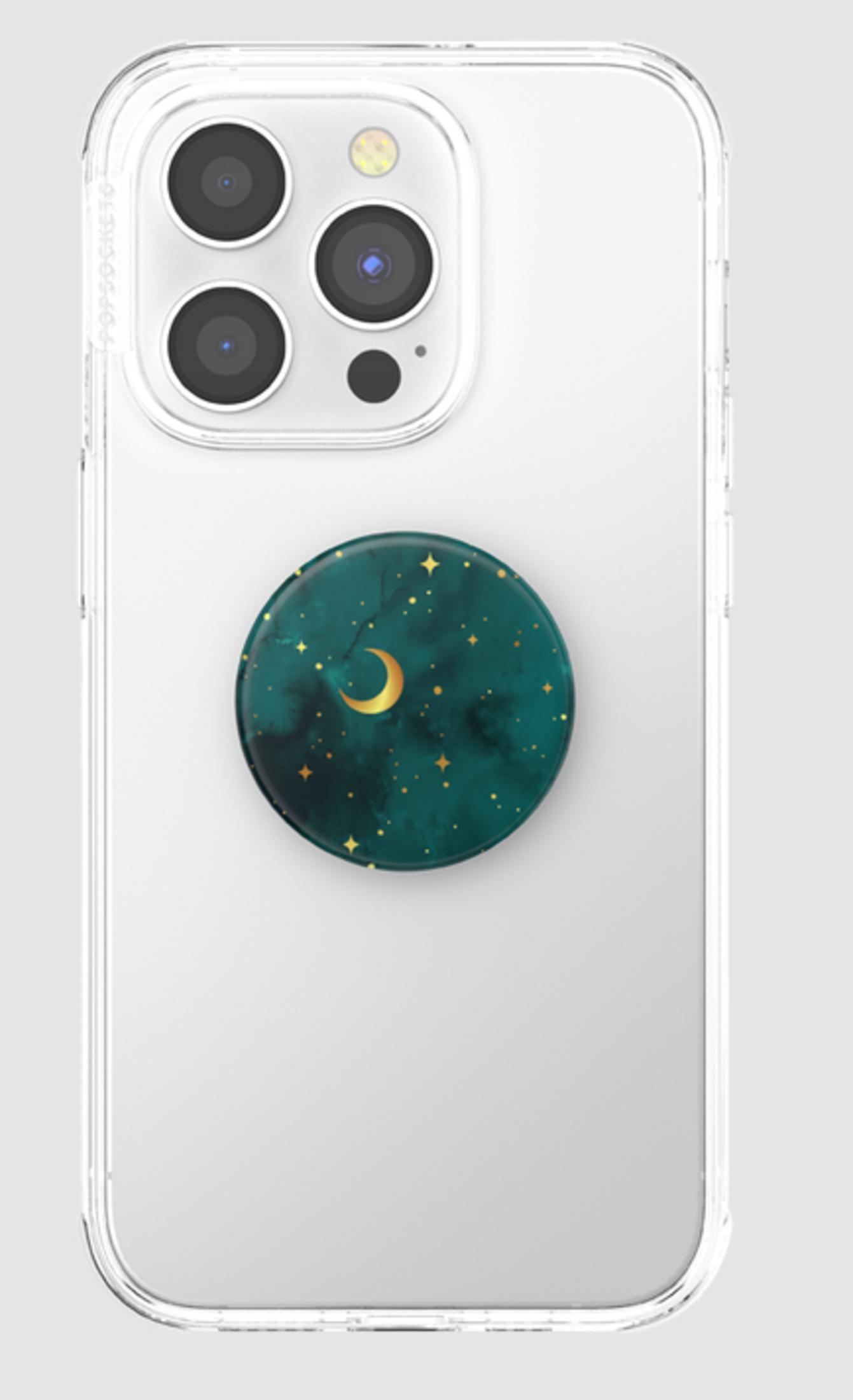 Ein grüner PopSocket mit goldenem Mond und Sternen auf einem transparenten Handy.