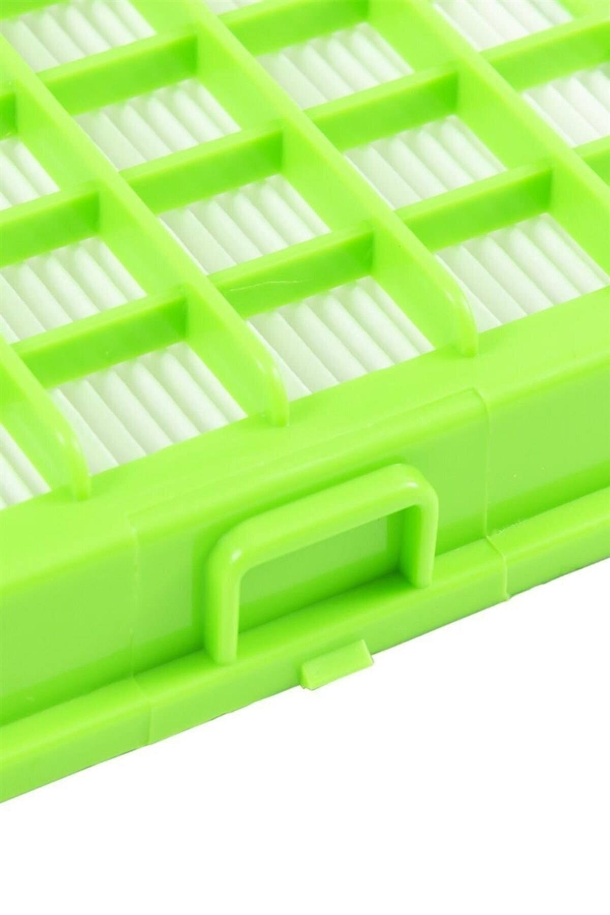 Arkada beyaz pileli filtreli yeşil plastik çerçeve.