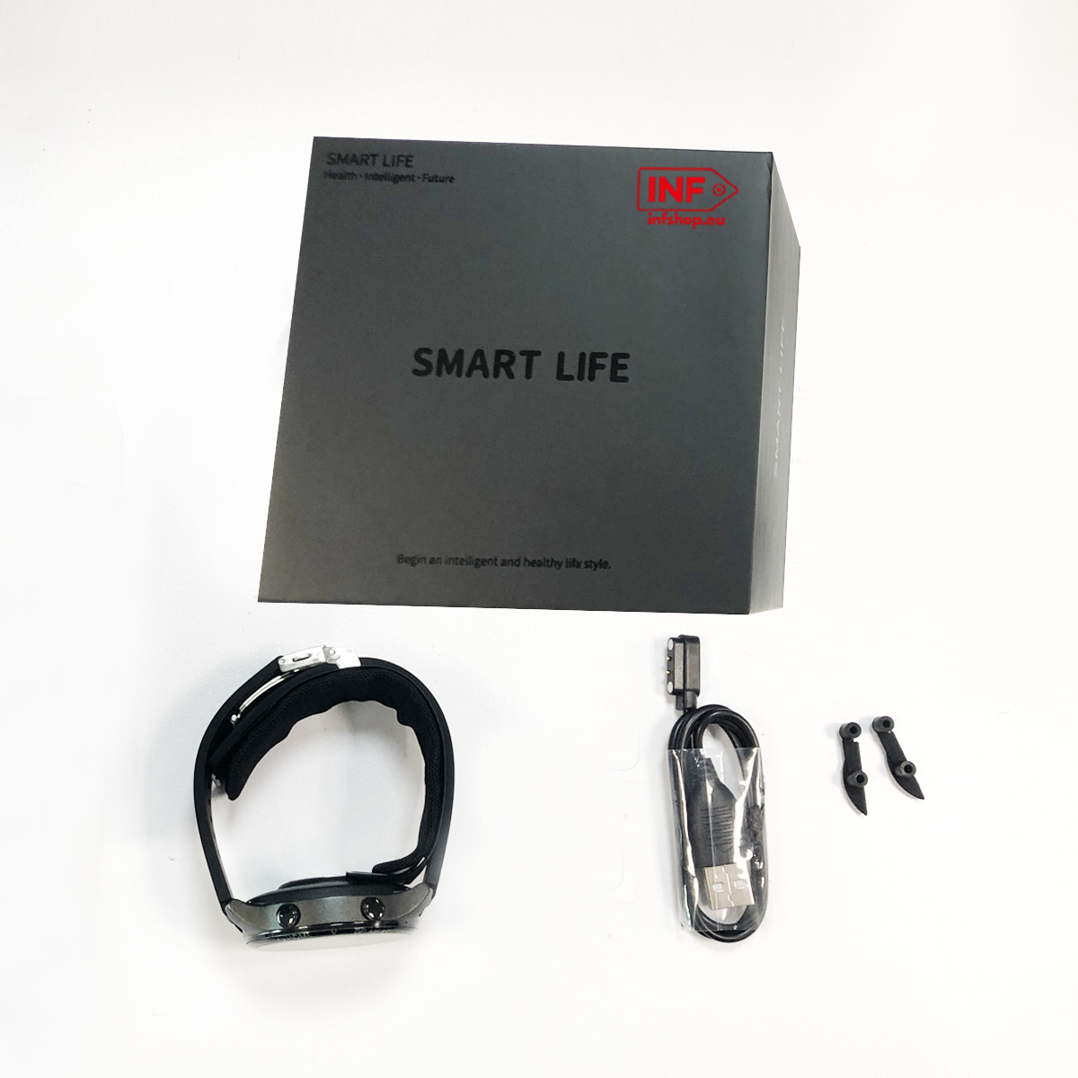 Smartwatch with charging cable and clips on a box labeled "SMART LIFE".