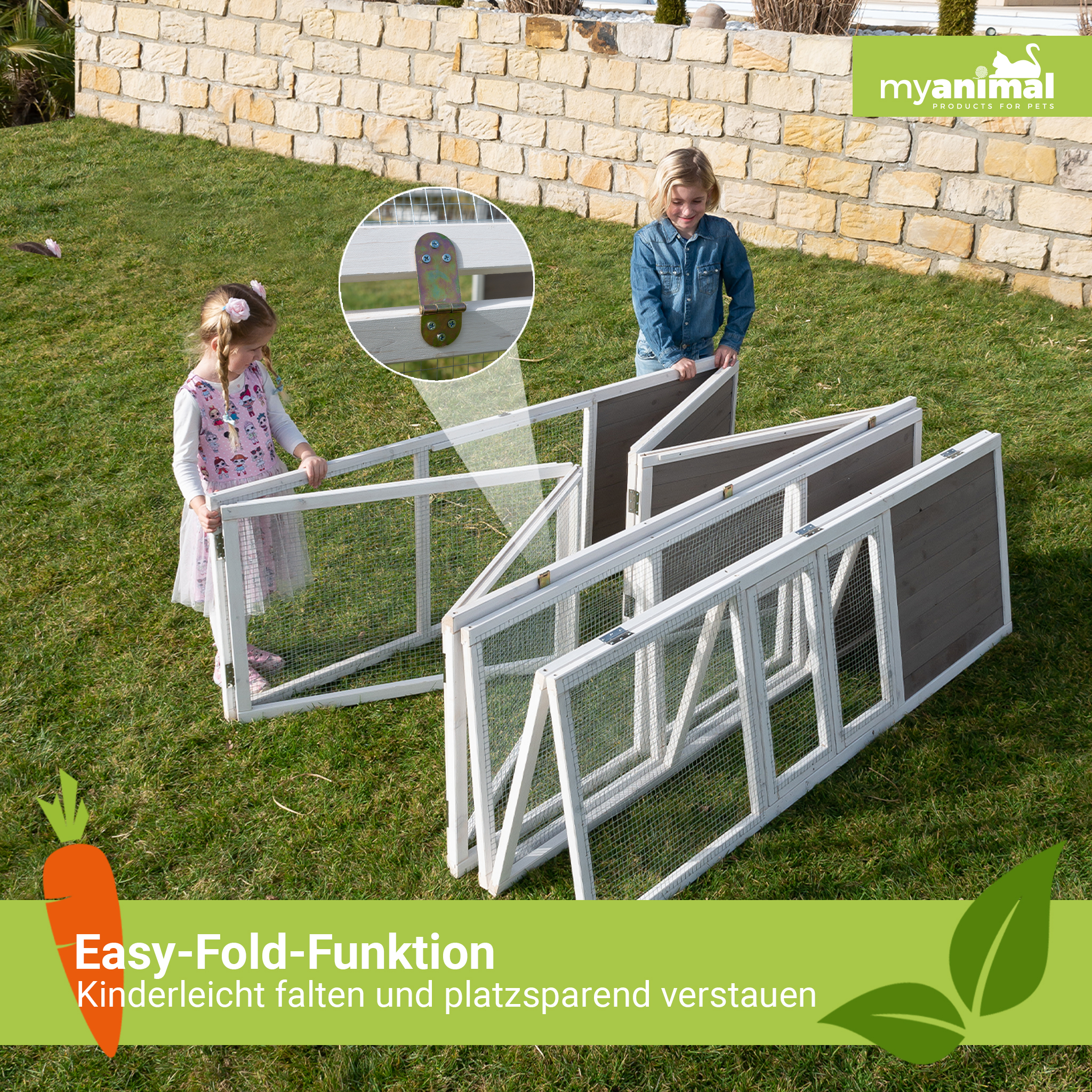 Zwei Kinder bauen einen zusammenklappbaren Hasenstall im Garten auf.