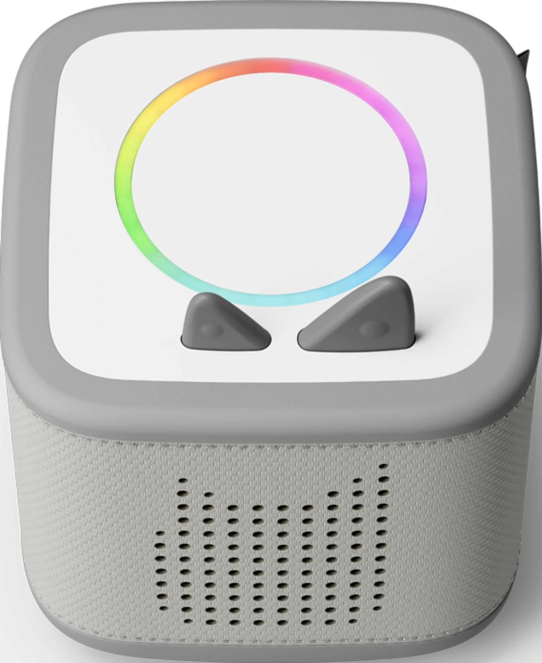 Ein grauer Lautsprecher mit einer Regenbogen-LED-Leiste und zwei grauen Knöpfen.