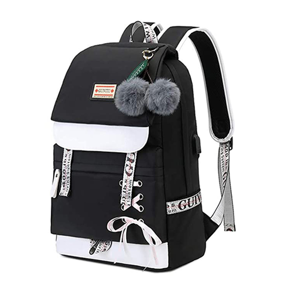 Ein schwarzer Rucksack mit weißen Akzenten, zwei flauschigen Bommeln und einer rosa Schleife.