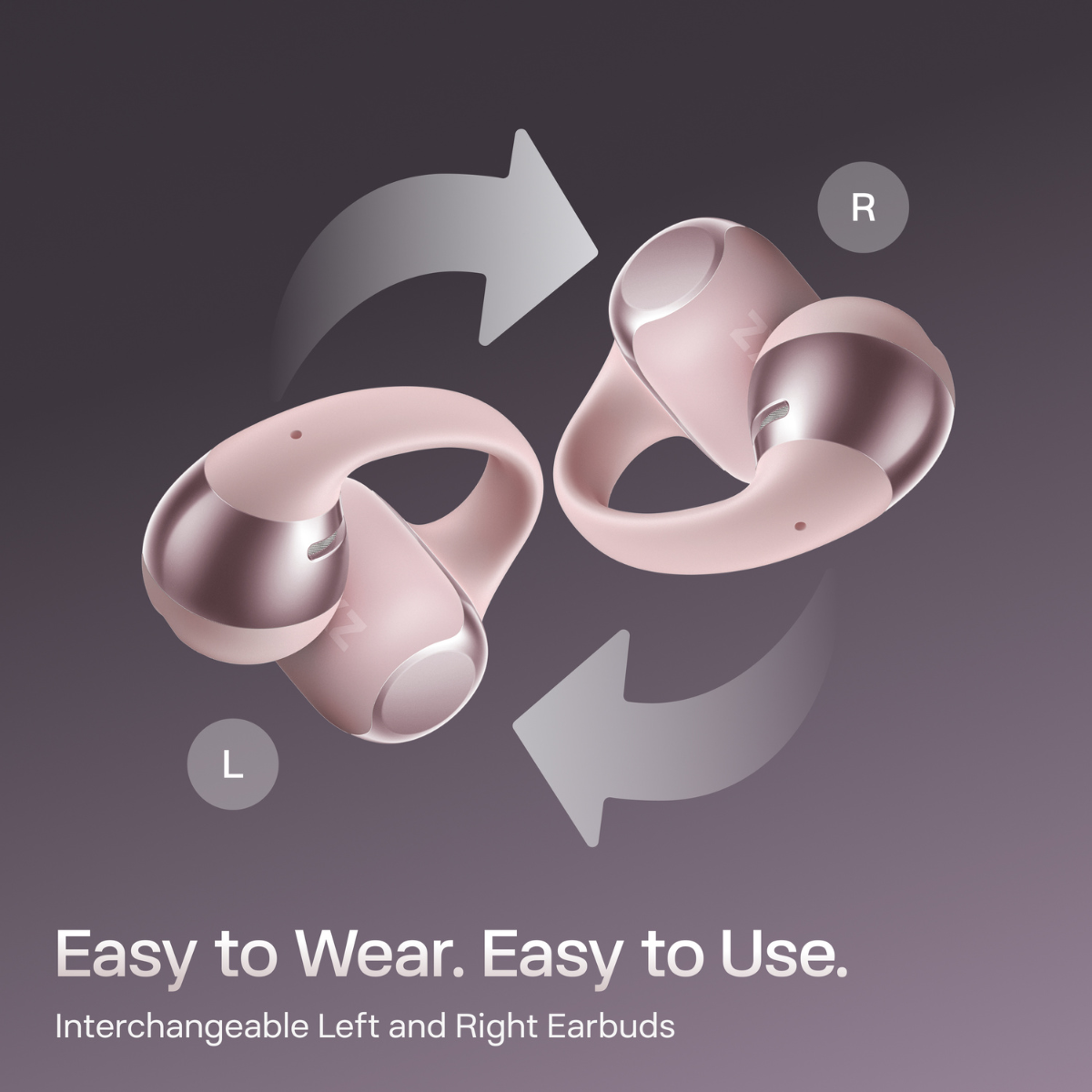 Dwa różowe, wymienne słuchawki z srebrnymi końcówkami na ciemnym tle.