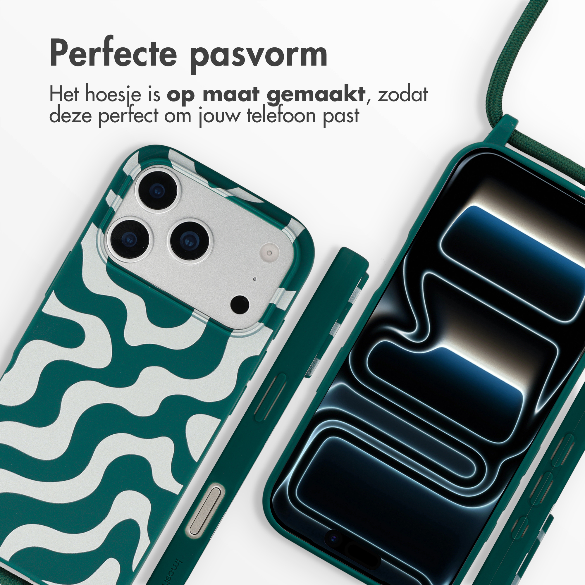 Een groene telefoonhoes met wit golvend patroon naast een telefoon.