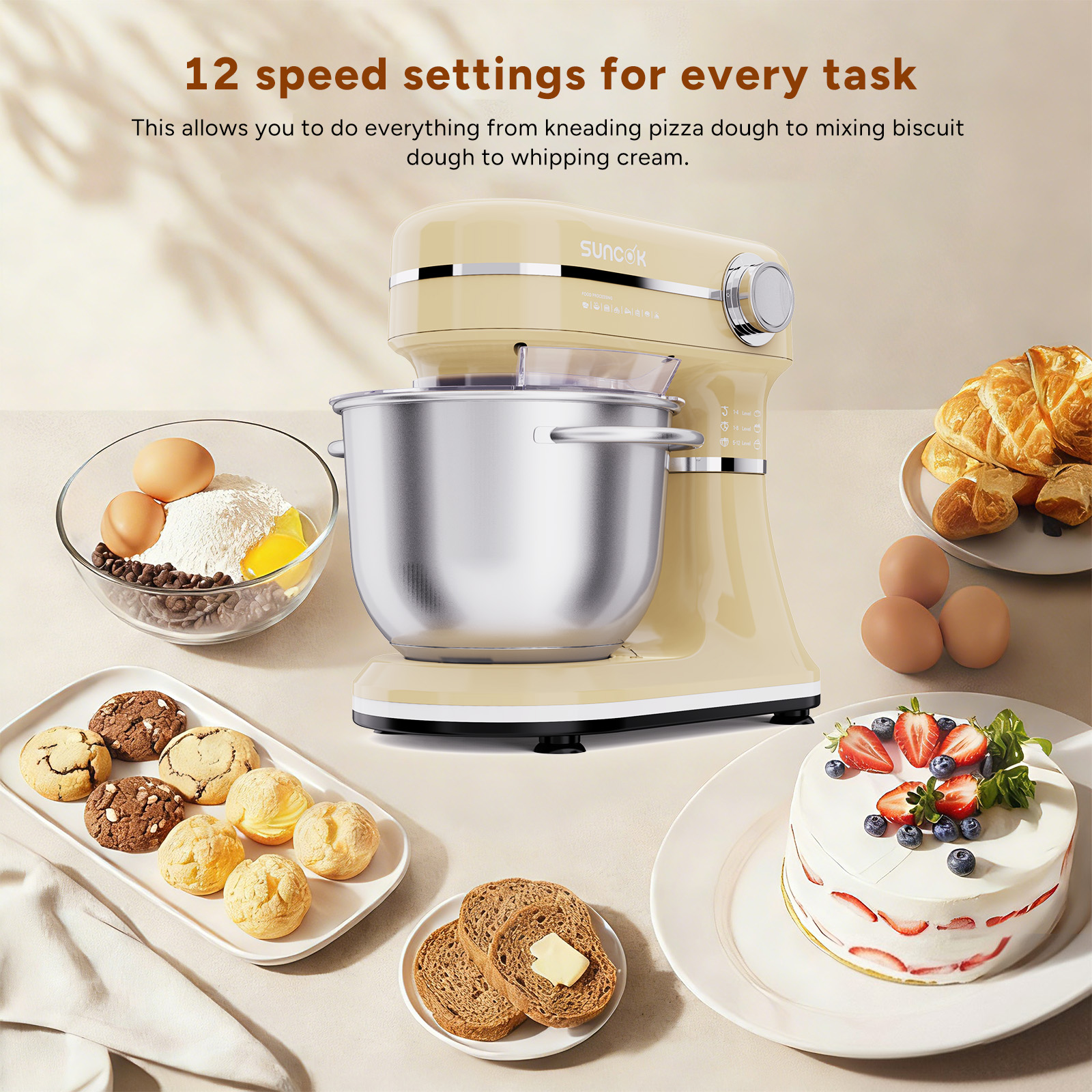 Kremowy mikser stojący z akcesoriami, chlebem, ciastkami i ciastem.