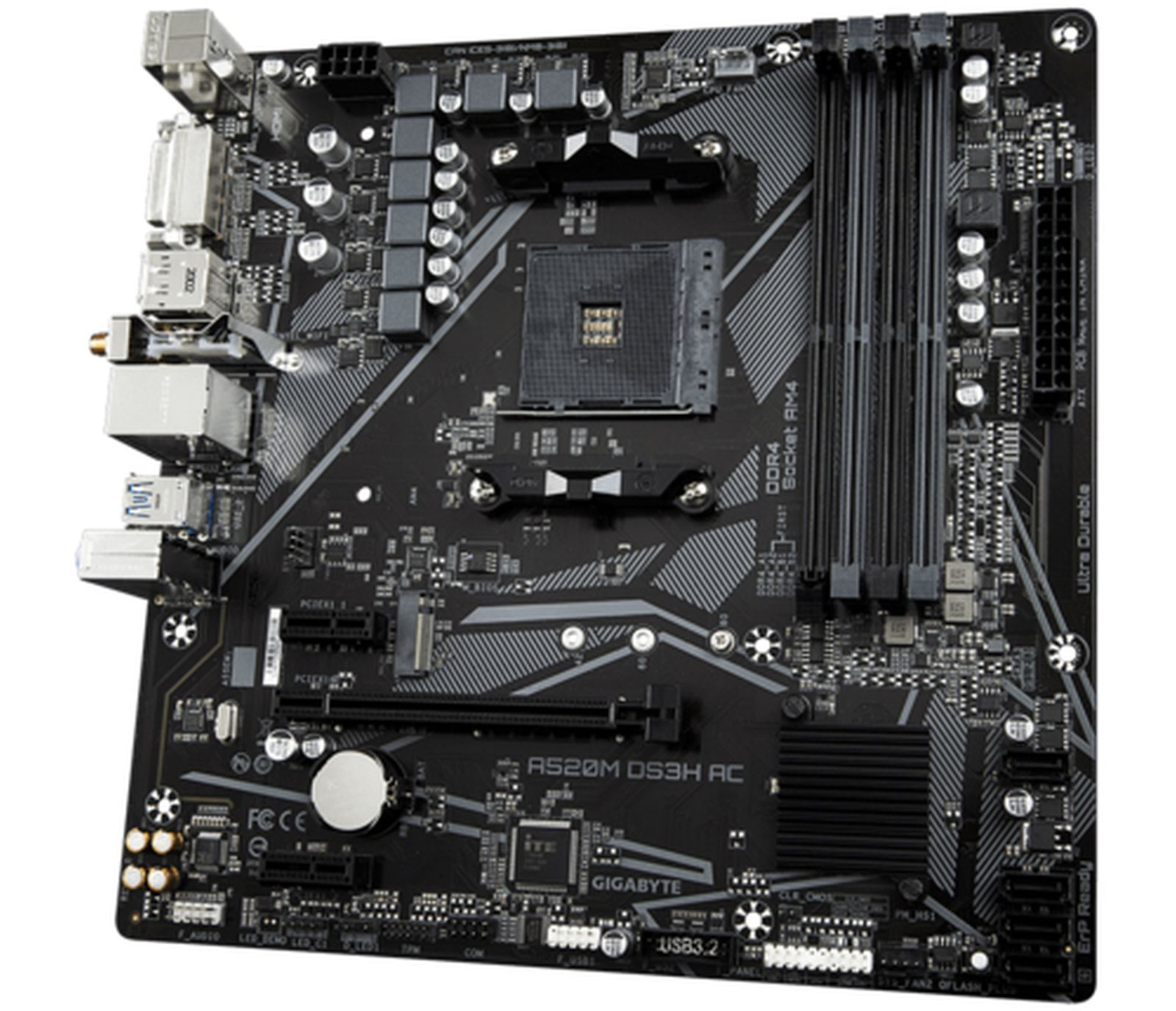 Carte mère noire avec socket CPU, emplacements RAM et ports.