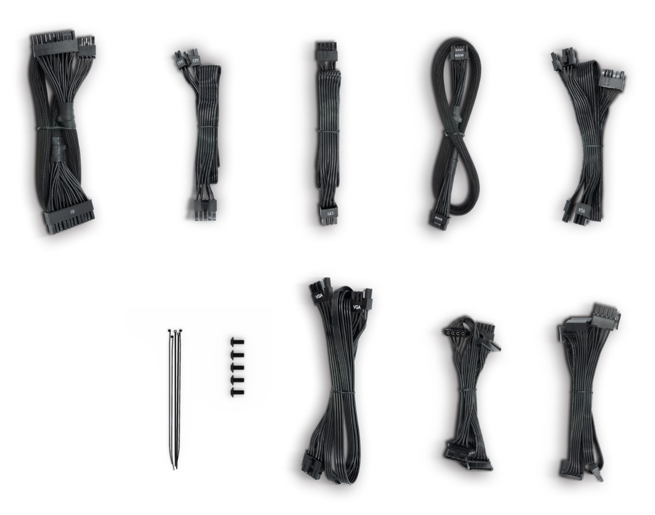 Several black computer cables, zip ties, and screws on a white background.