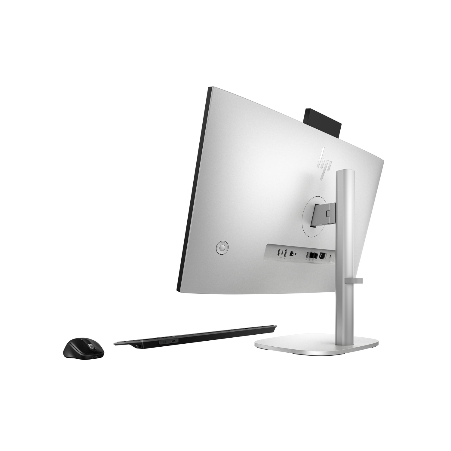 Widok z tyłu srebrnego komputera HP All-in-One z myszą i klawiaturą.