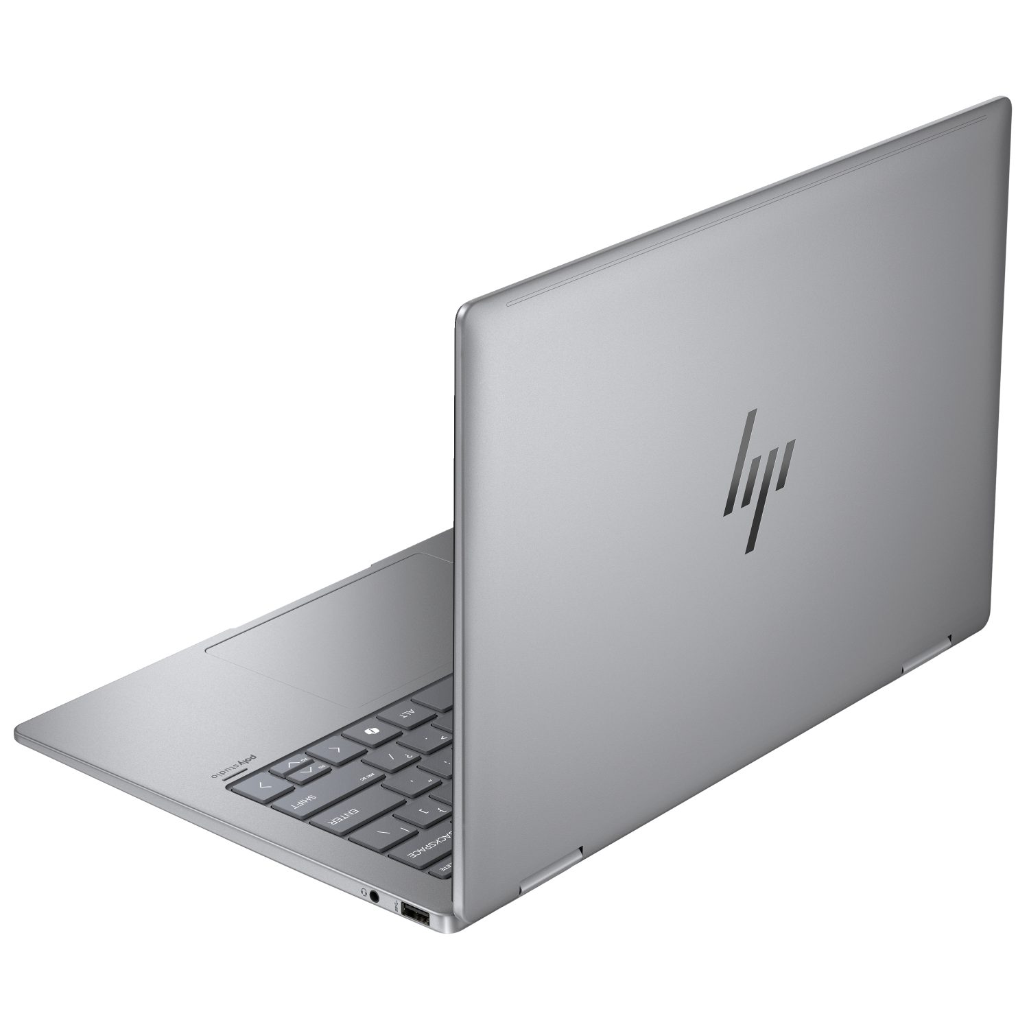 Srebrny laptop HP, widziany z boku, z otwartą klawiaturą.
