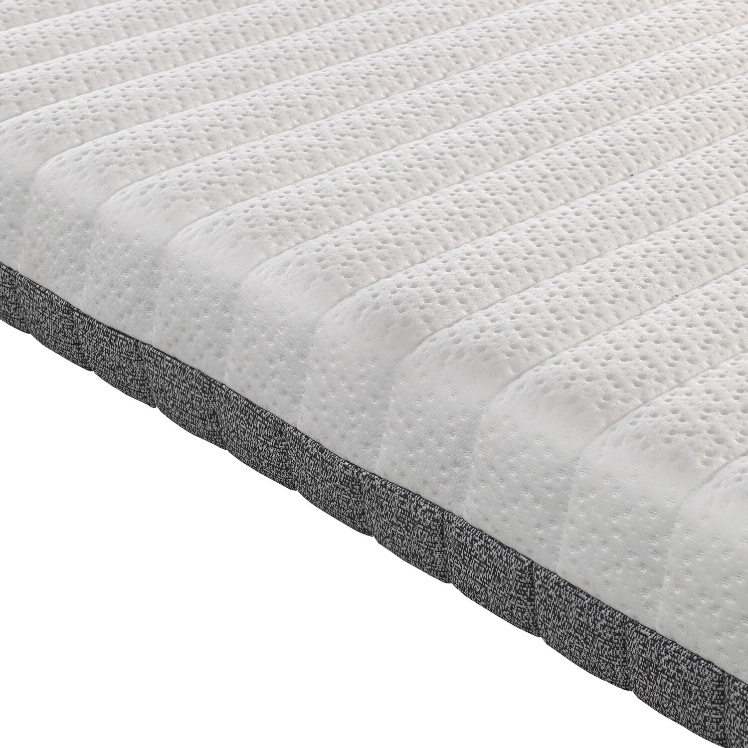 Primer plano de un colchón blanco con líneas acolchadas y borde gris.