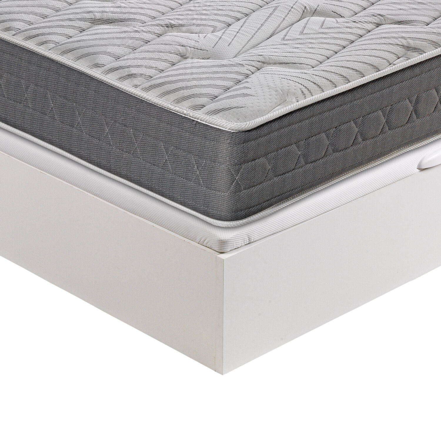 Una parte superior de colchón acolchado gris y blanco sobre un marco de cama blanco.