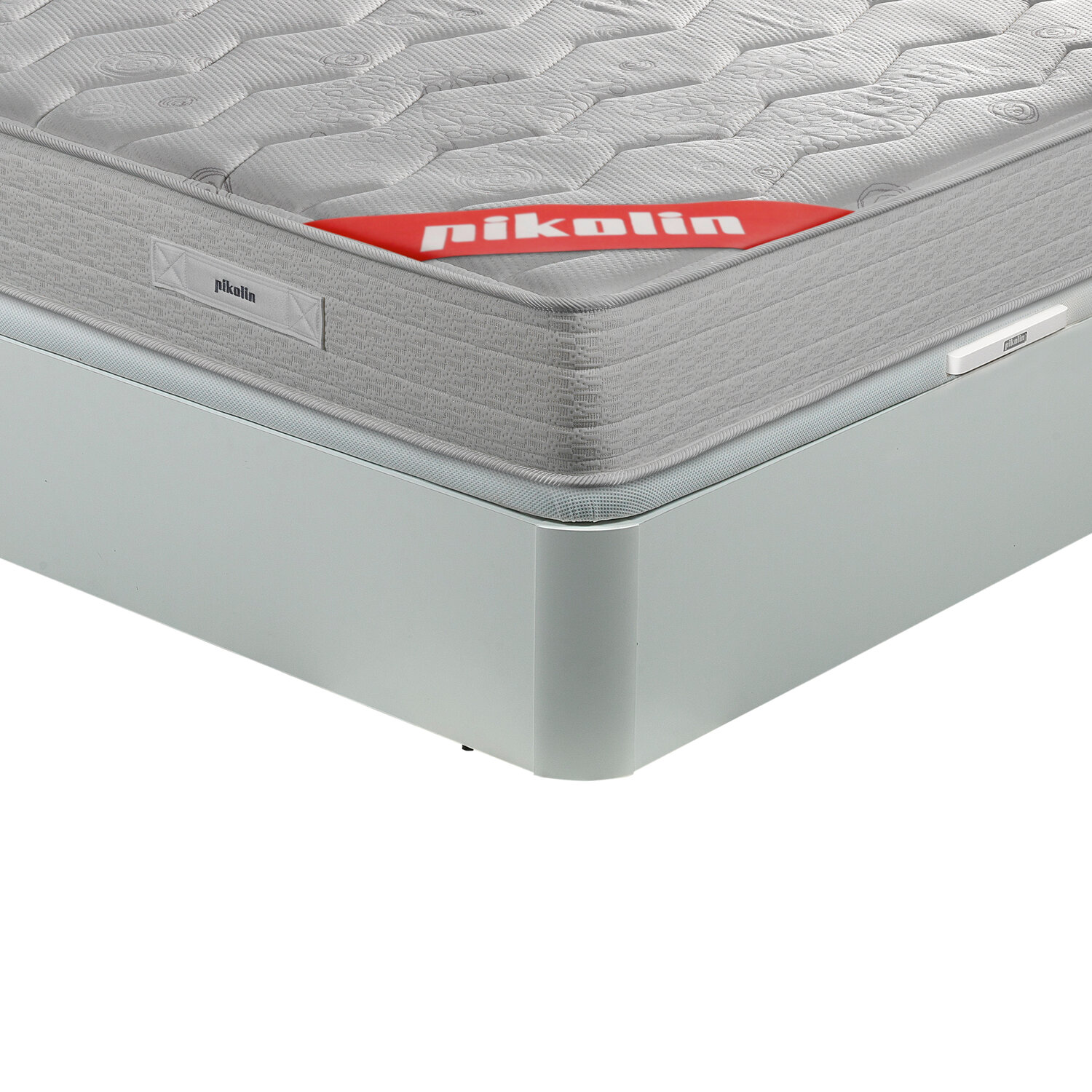 Colchón gris con logo rojo "pıkolin" sobre base de cama gris claro.