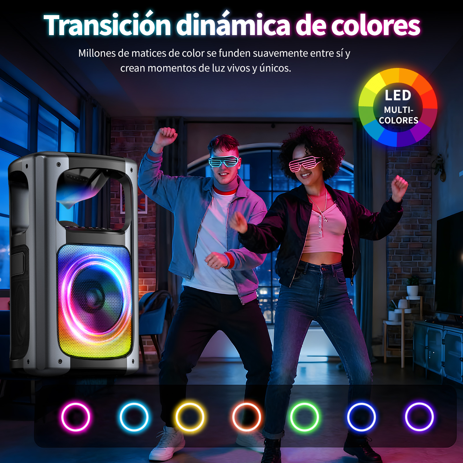Un uomo e una donna ballano davanti a uno speaker colorato con spettacolo di luci.