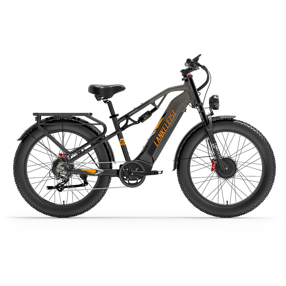 Bicicleta eléctrica gris con neumáticos anchos, portabultos y suspensión.