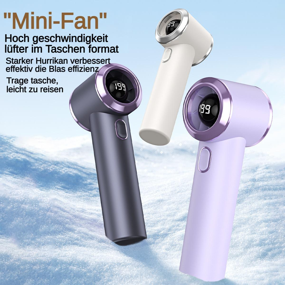 Drei Mini-Ventilatoren in Grau, Lila und Weiß auf Schnee.
