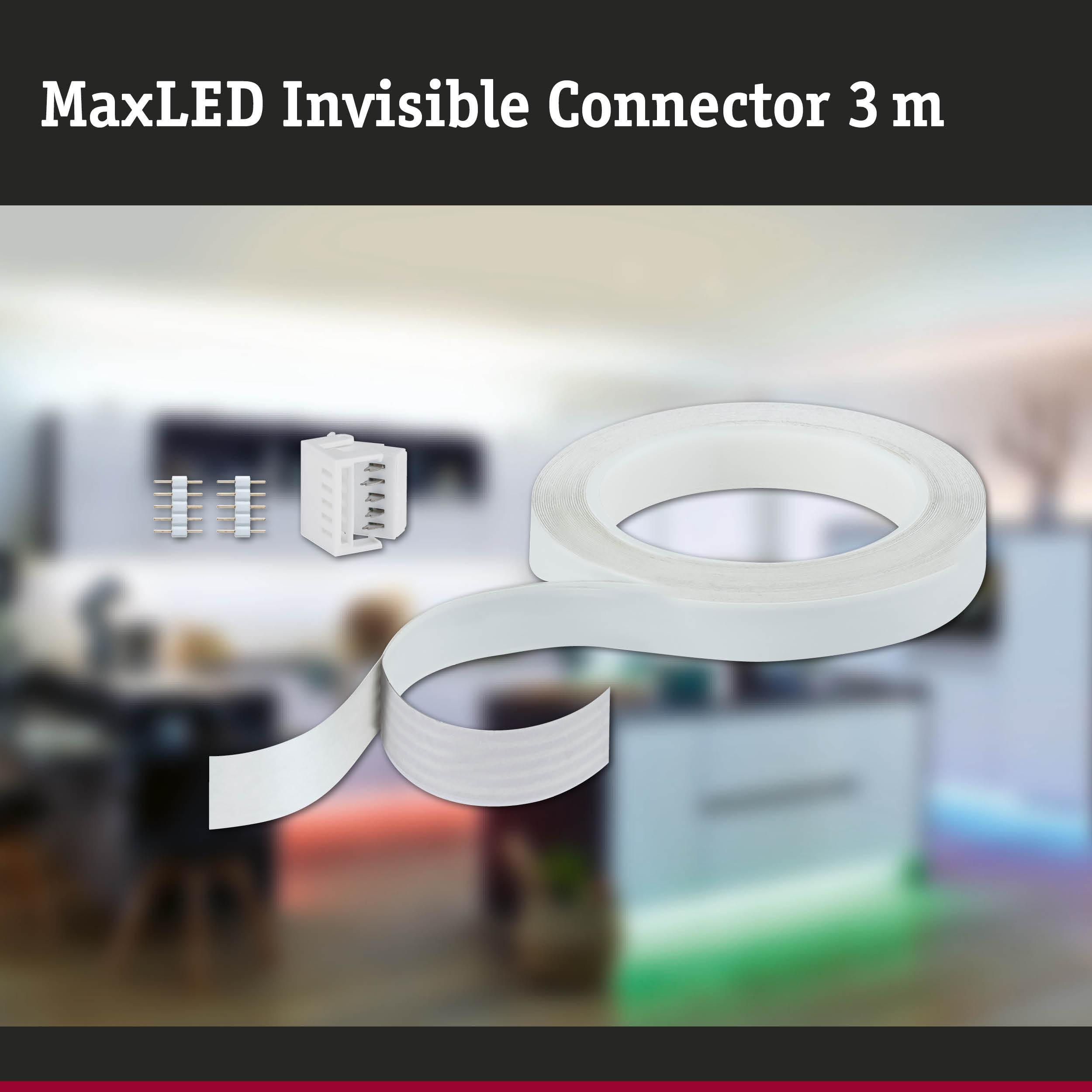 MaxLED Verbinder und Klebeband vor unscharfem Hintergrund mit Lichtern.