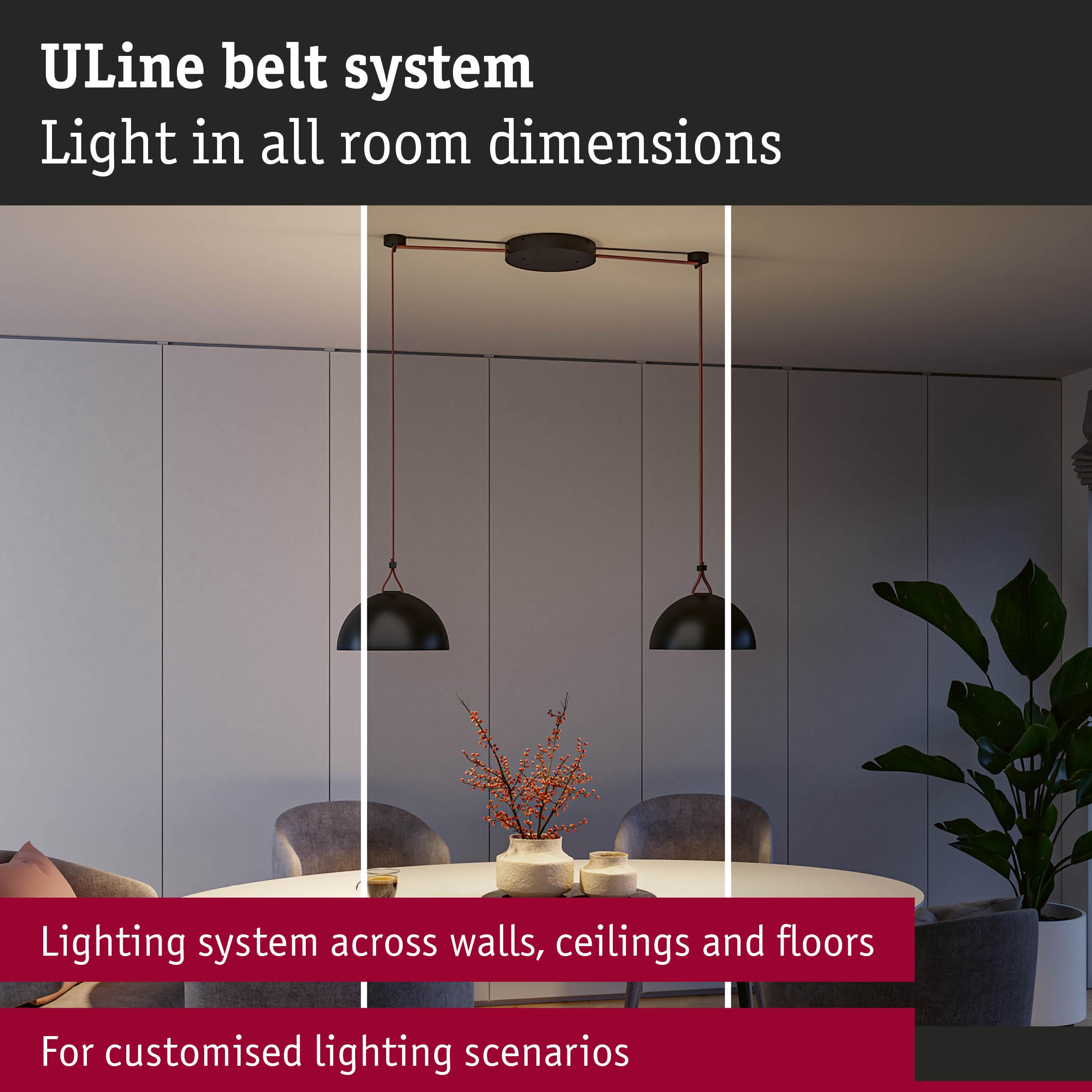 Système d'éclairage moderne avec suspensions noires au-dessus d'une table.