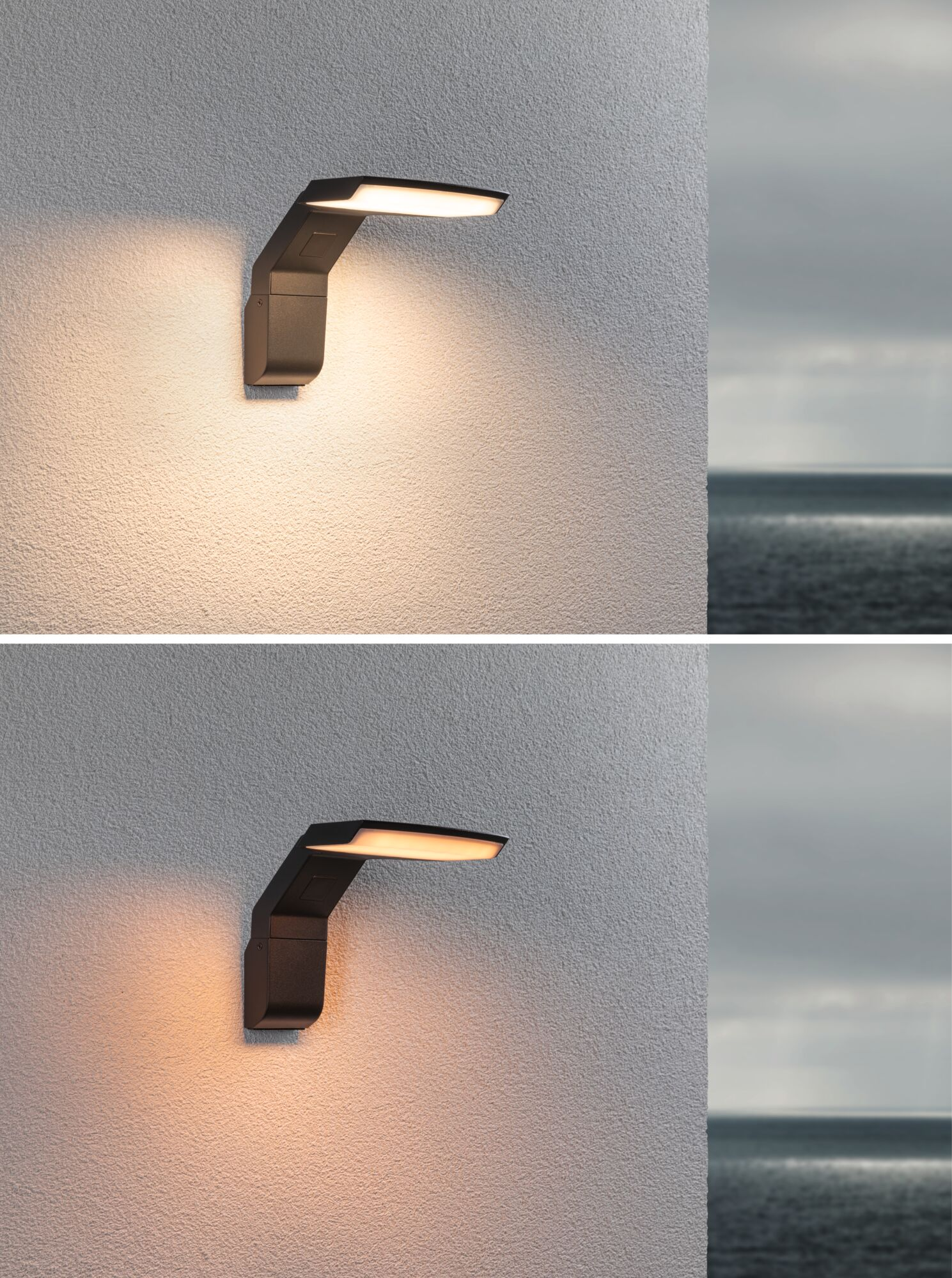 Nowoczesna lampa ścienna oświetla szorstką ścianę, obok morze przy pochmurnym niebie.