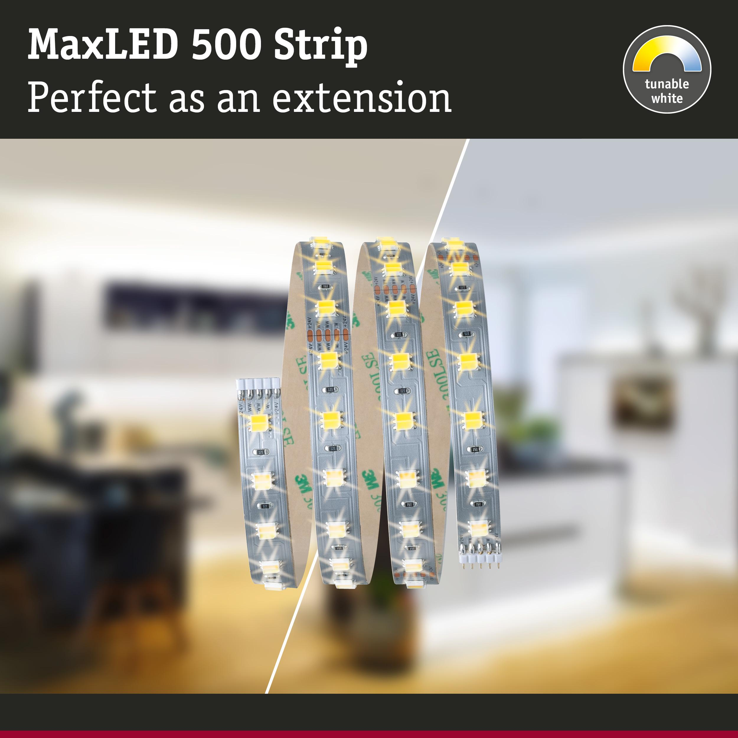 Tre rotoli di strisce LED con retro adesivo, giallo brillante, sfondo sfocato.