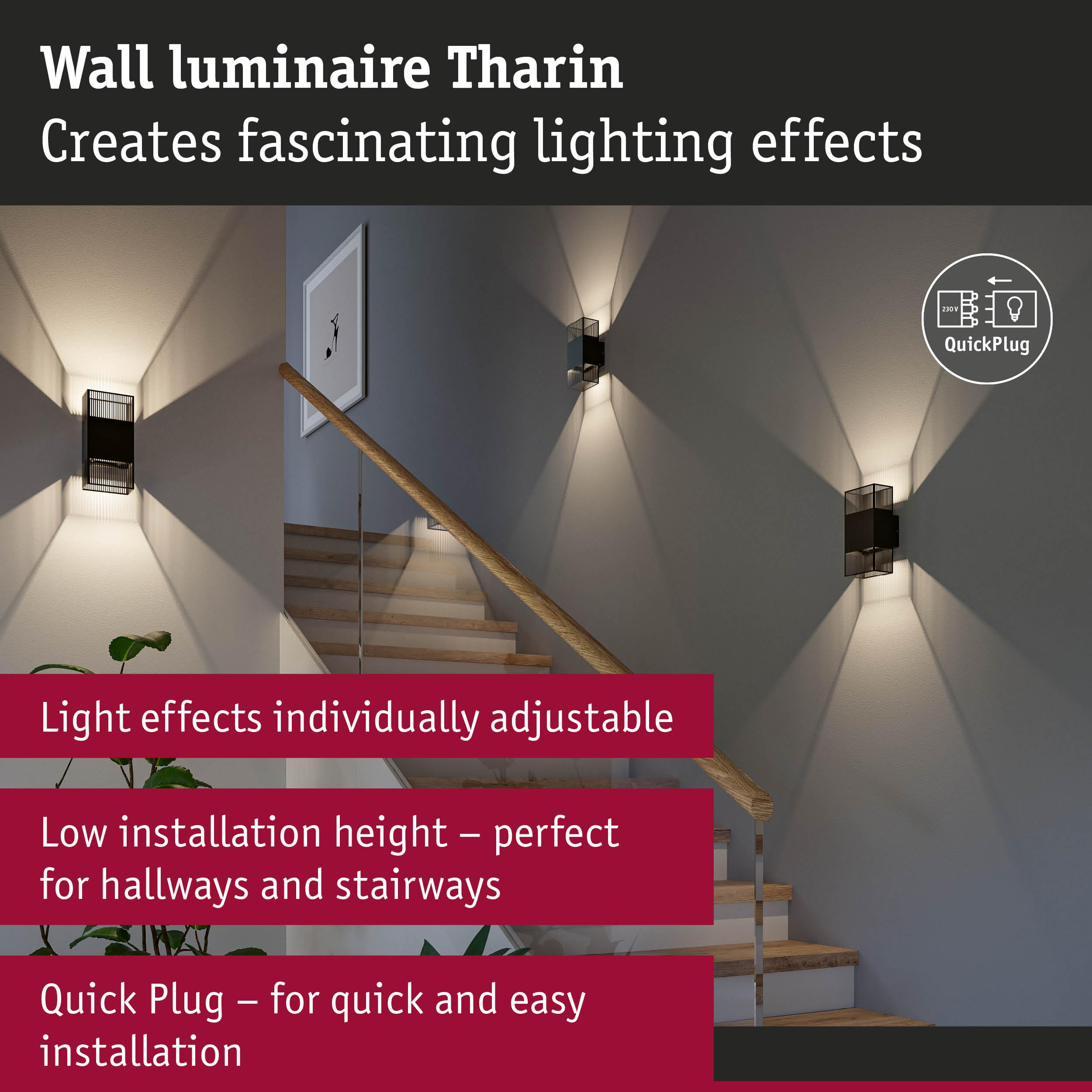 Applique murale Tharin avec effets lumineux sur un escalier.