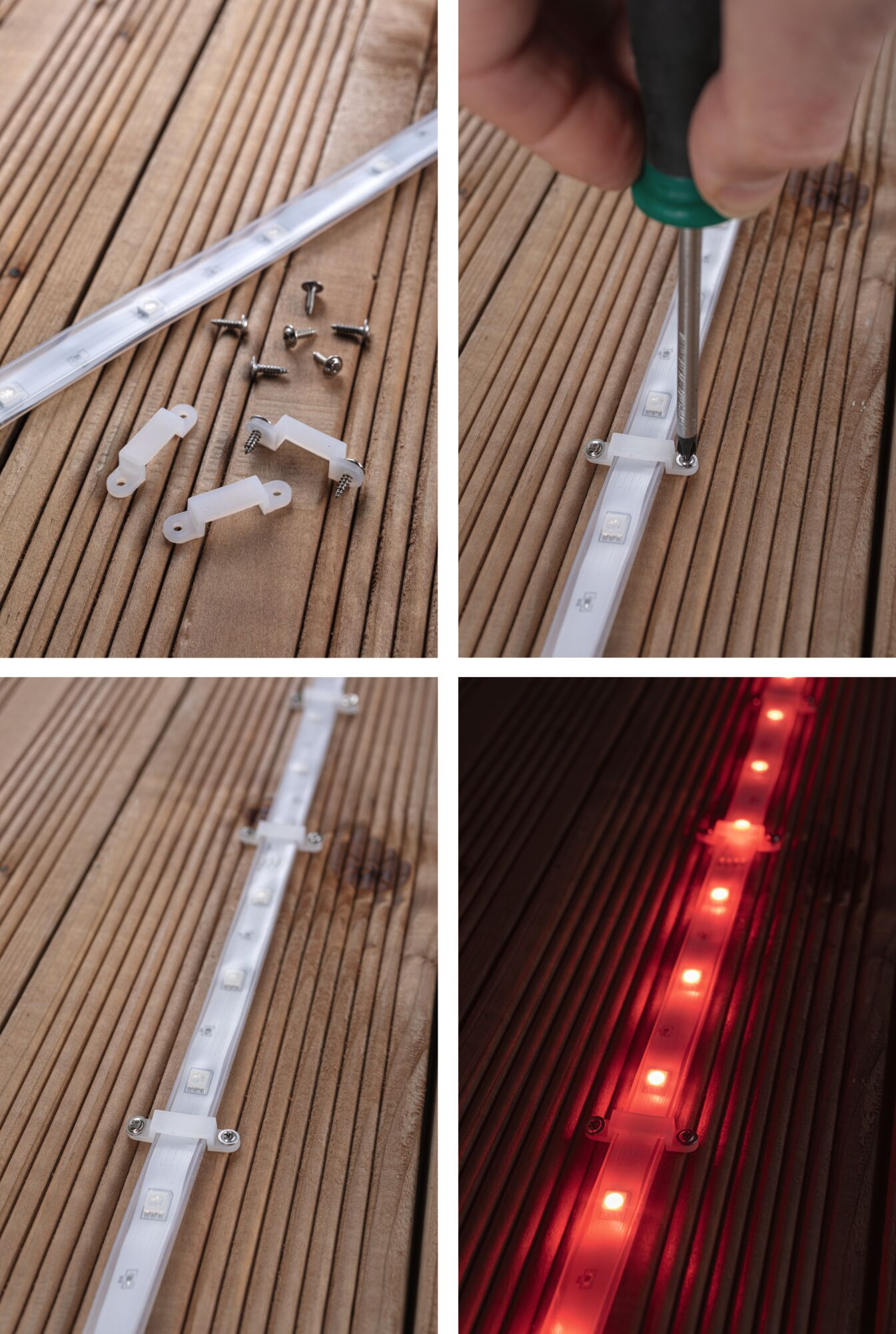 LED-Streifen mit Haltern und Schrauben auf Holzoberfläche montiert. Ein Streifen leuchtet rot.