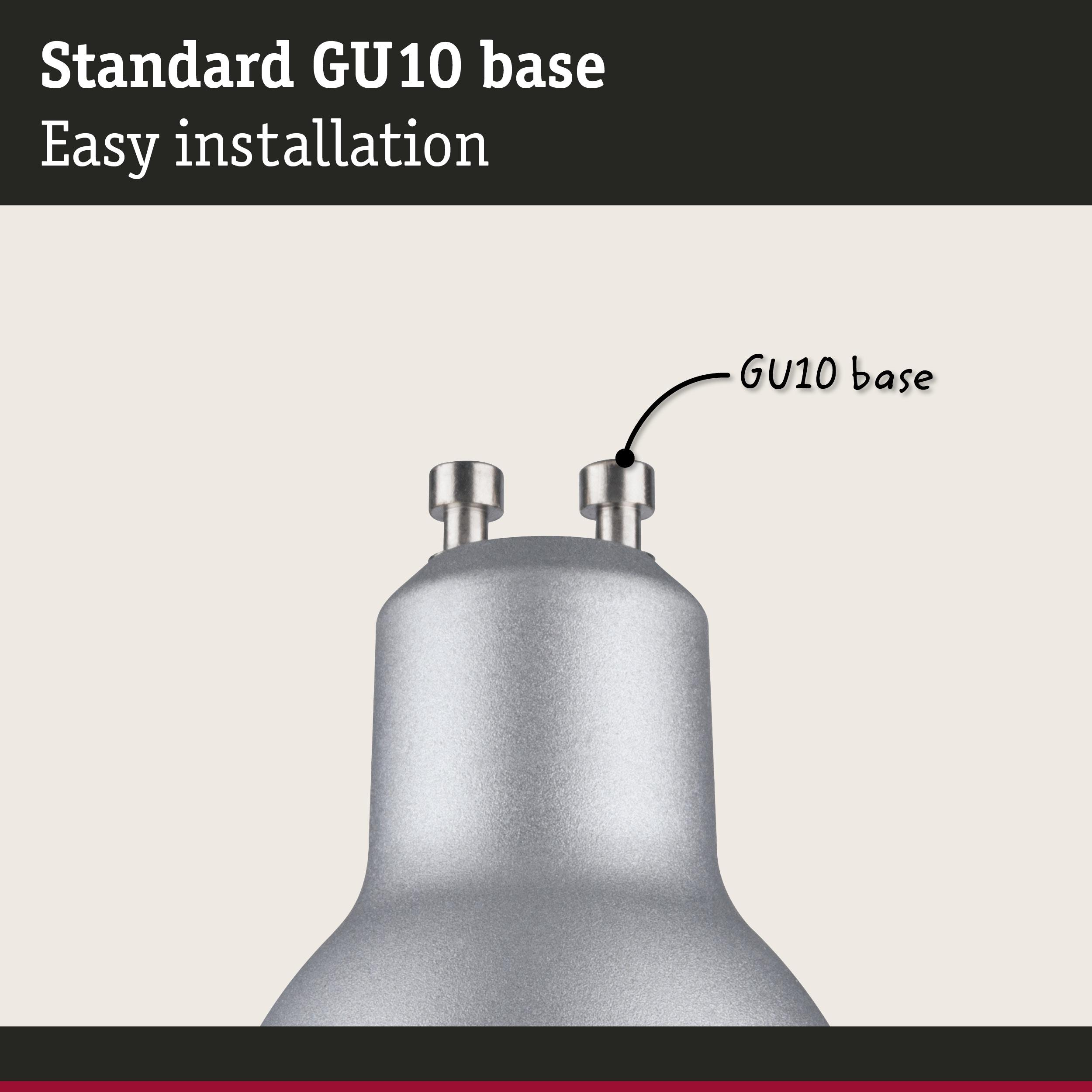 Zbliżenie srebrnej podstawy GU10 z dwoma bolcami.