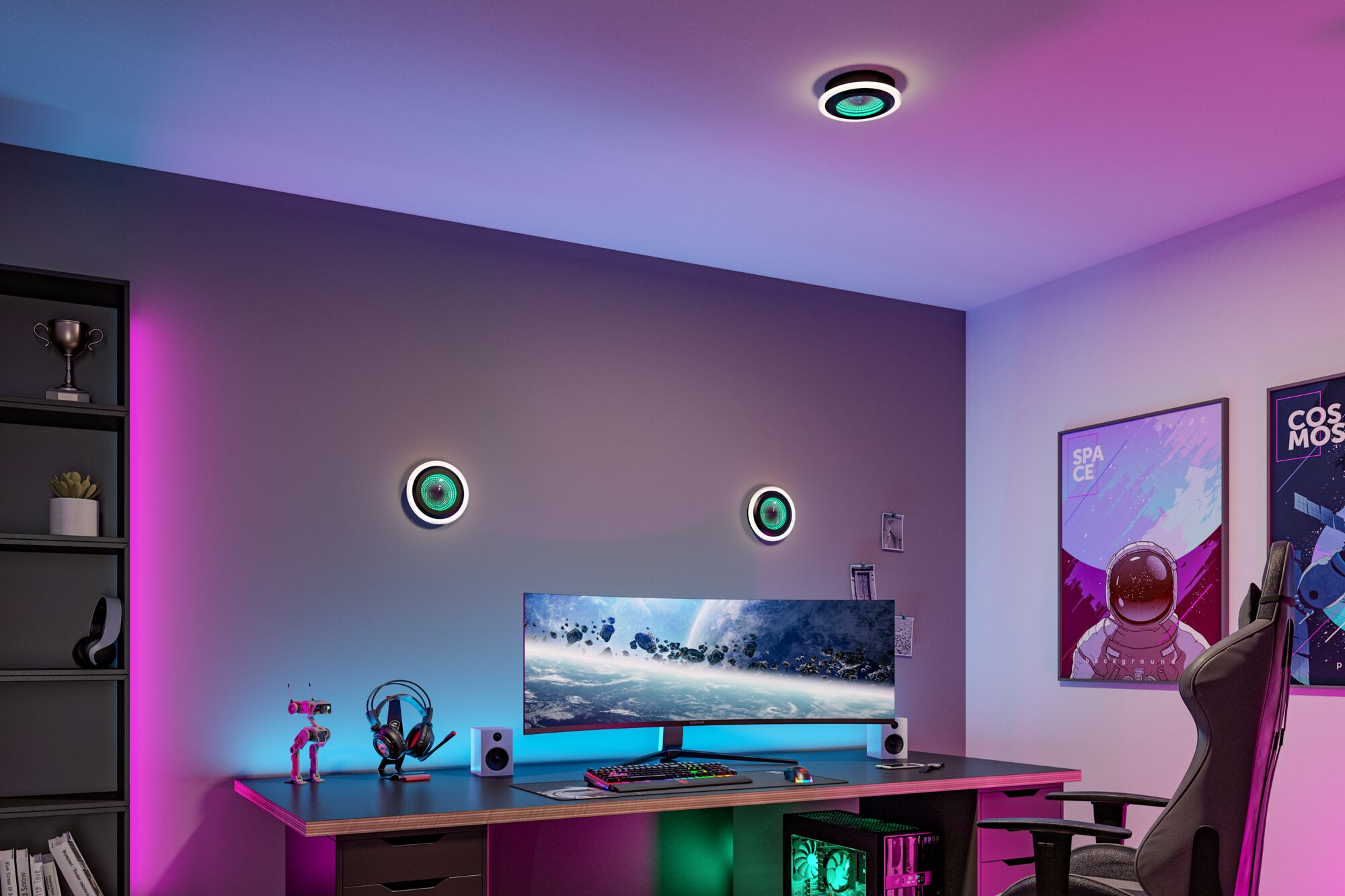 Schreibtisch eines Gamers mit gebogenem Monitor, PC, Kopfhörern und bunter LED-Beleuchtung.