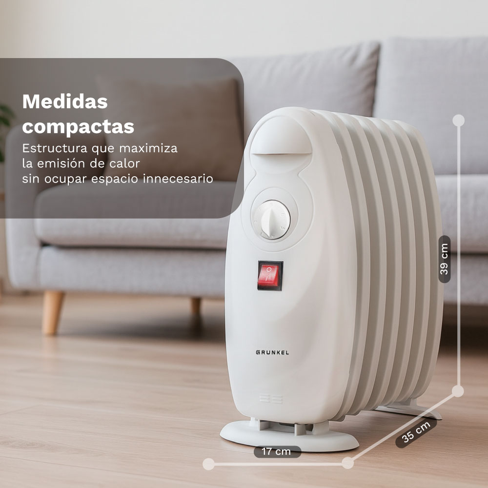 Un radiador eléctrico blanco compacto con dial y botón rojo, sobre suelo de madera.