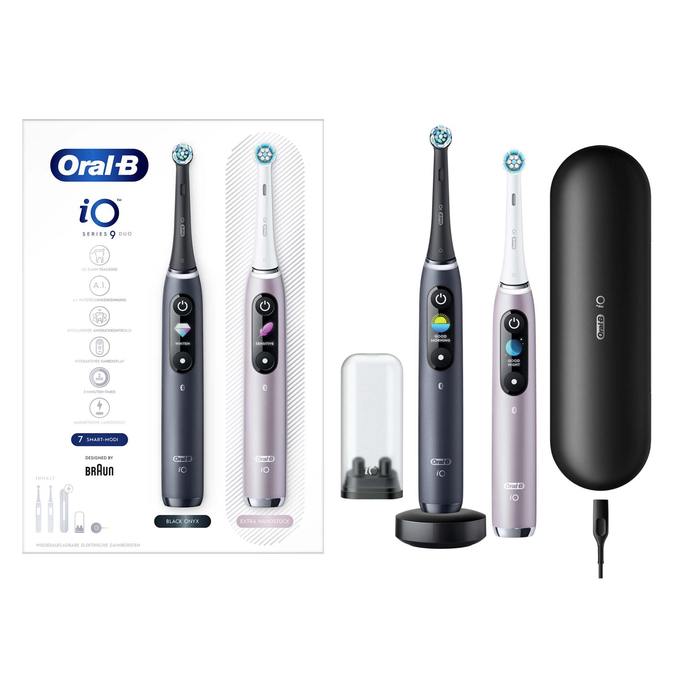Oral-B iO diş fırçaları: siyah, mor, gri şarj istasyonu ve seyahat çantası.