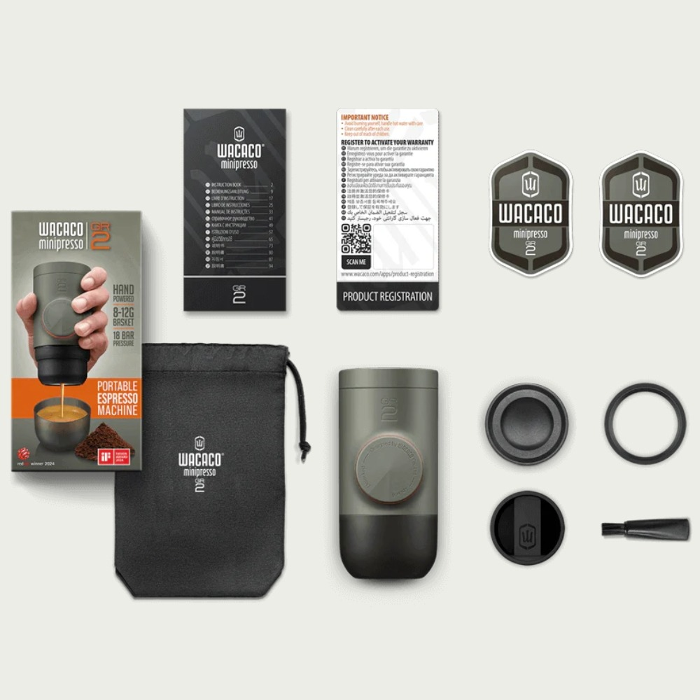 Wacaco Minipresso GR2 Kaffeemaschine mit Zubehör und Anleitung.