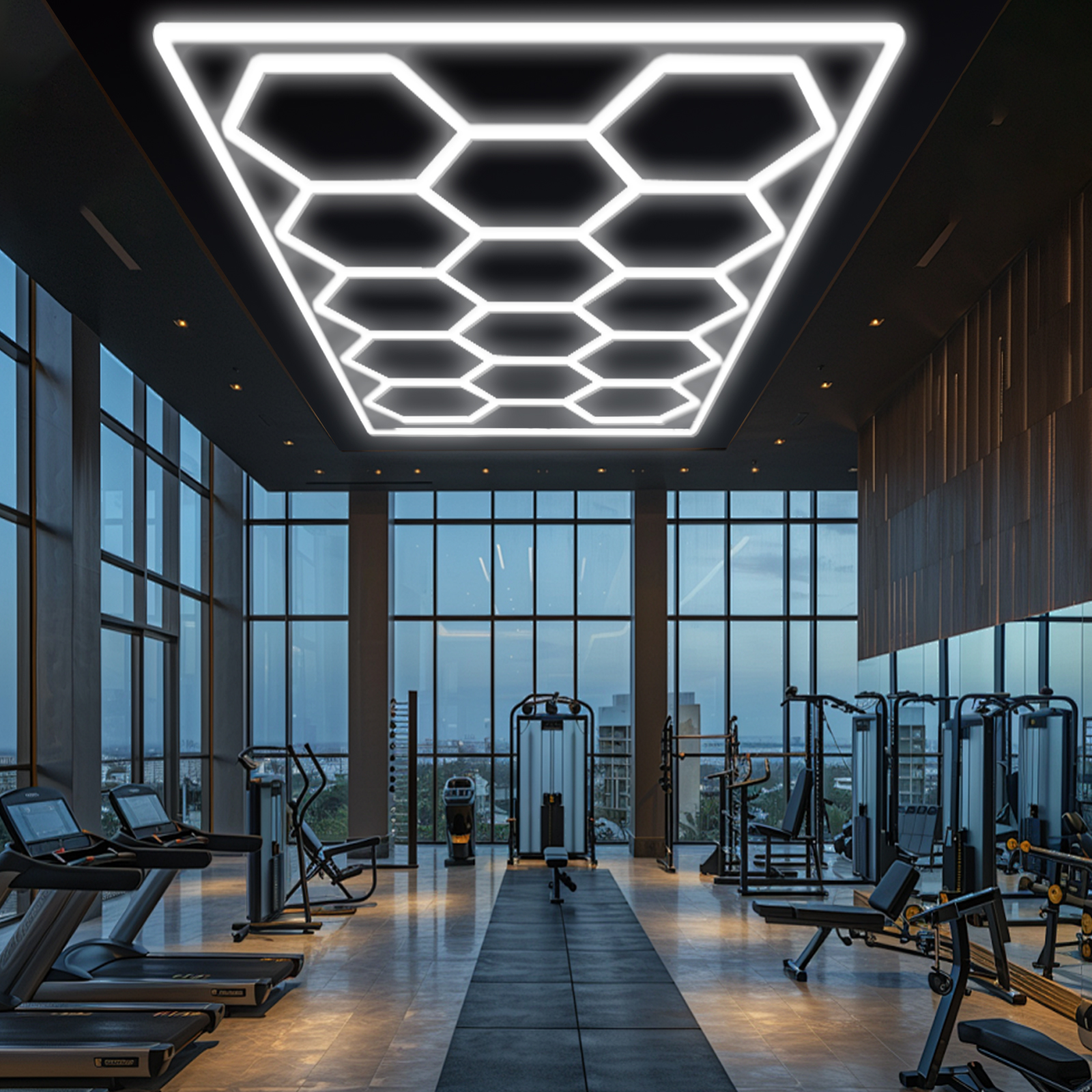 Gimnasio moderno con cintas de correr, máquinas de pesas y grandes ventanales.