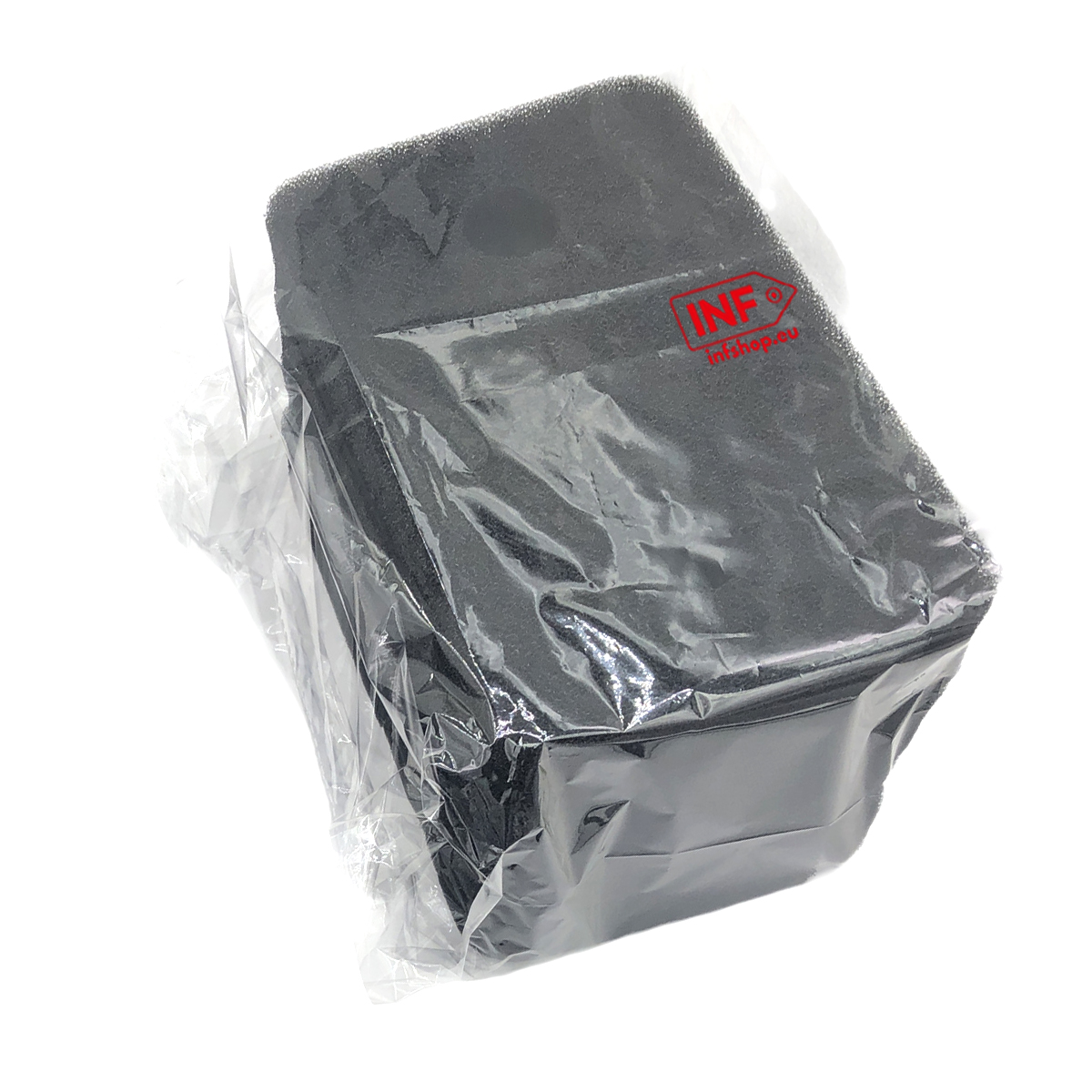 Black foam block in clear packaging with a logo.