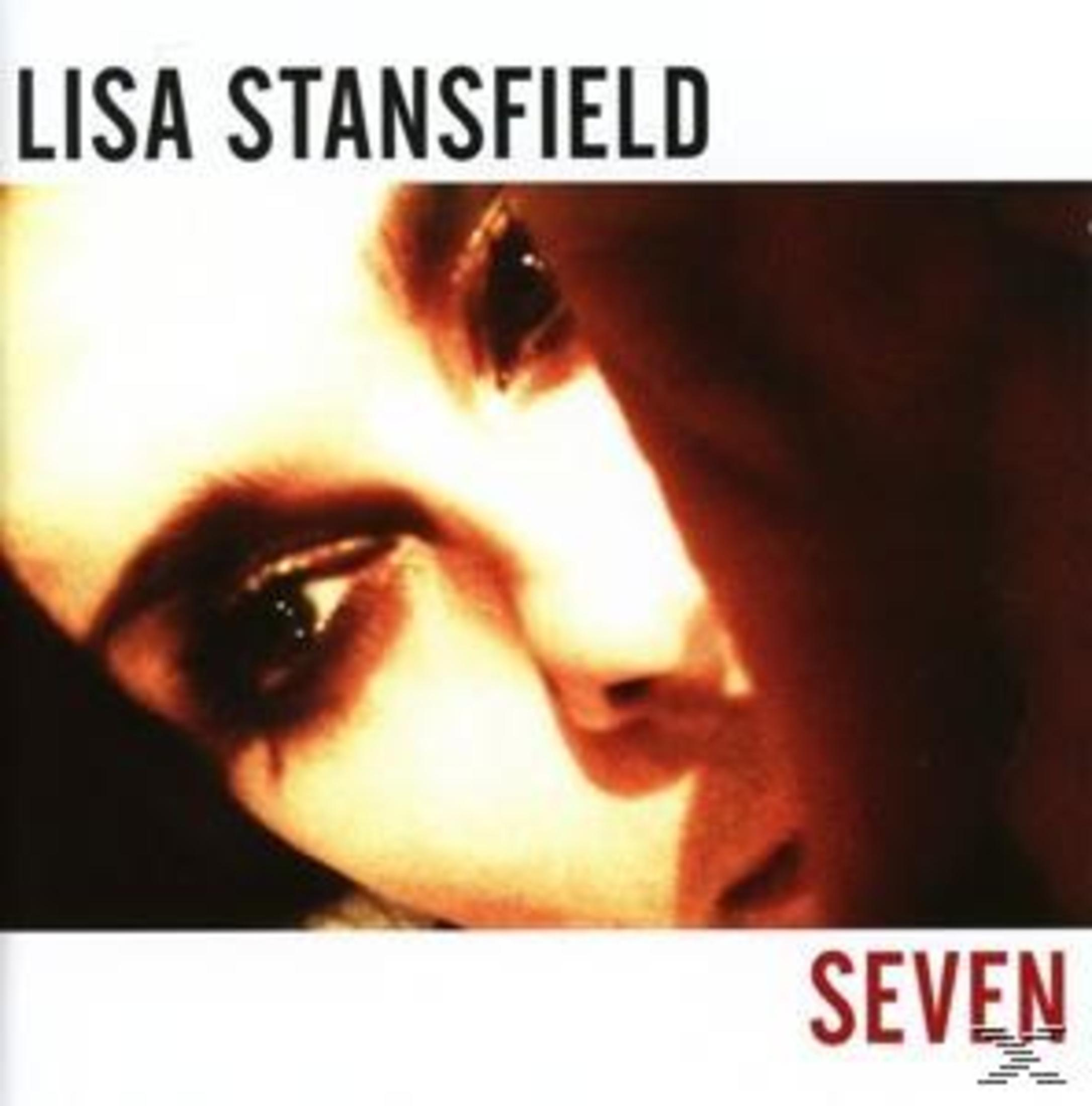 Primo piano del viso di Lisa Stansfield con il titolo "SEVEN".