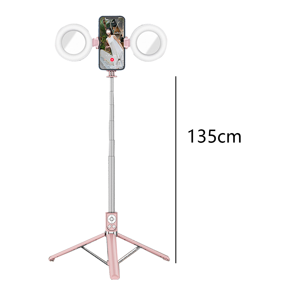 Ein rosa Selfie-Stick mit Stativ, Ringlichtern und einem Handyhalter.
